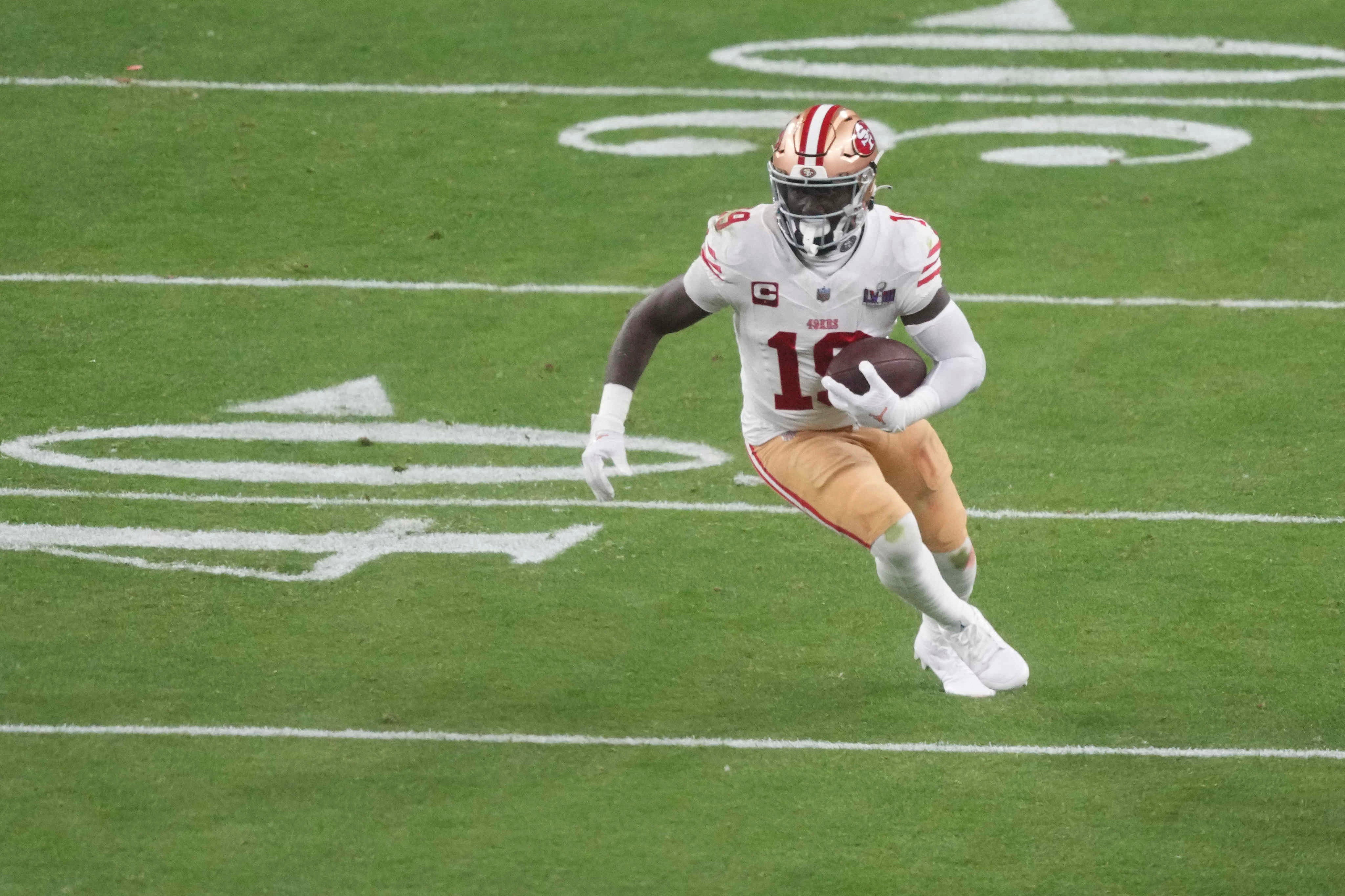 Feb 11, 2024; Paradise, Nevada, USA; San Francisco 49ers wide receiver Deebo Samuel (19) runs with the ball against the Kansas City Chiefs LVIII between Kansas City Chiefs and San Francisco 49ers at Allegiant Stadium.