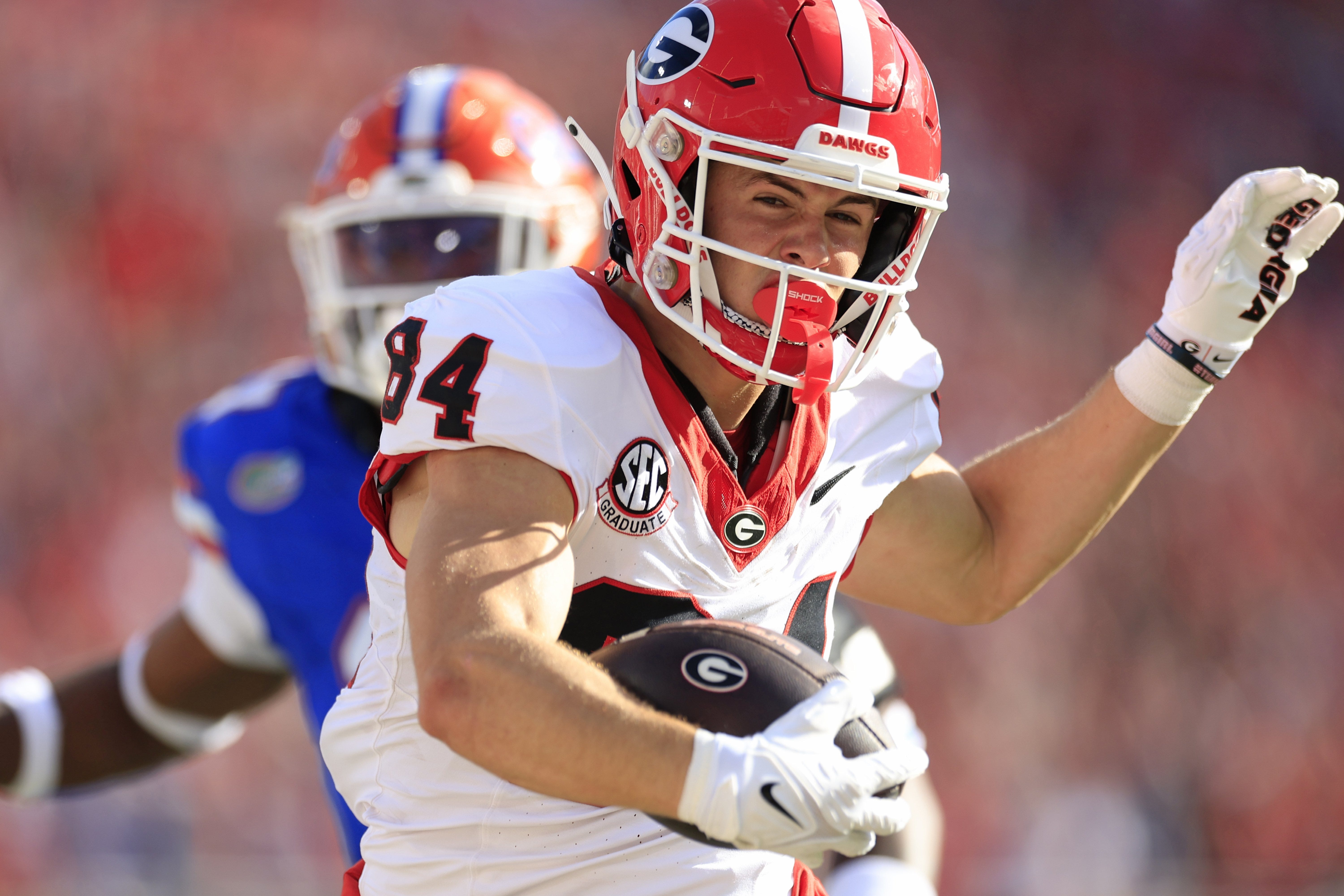 Georgia Bulldogs wide receiver Ladd McConkey (84) scores a touchdown during the first quarter of an NCAA Football game Saturday, Oct. 28, 2023 at EverBank Stadium in Jacksonville, Fla. [Corey Perrine/Florida Times-Union]