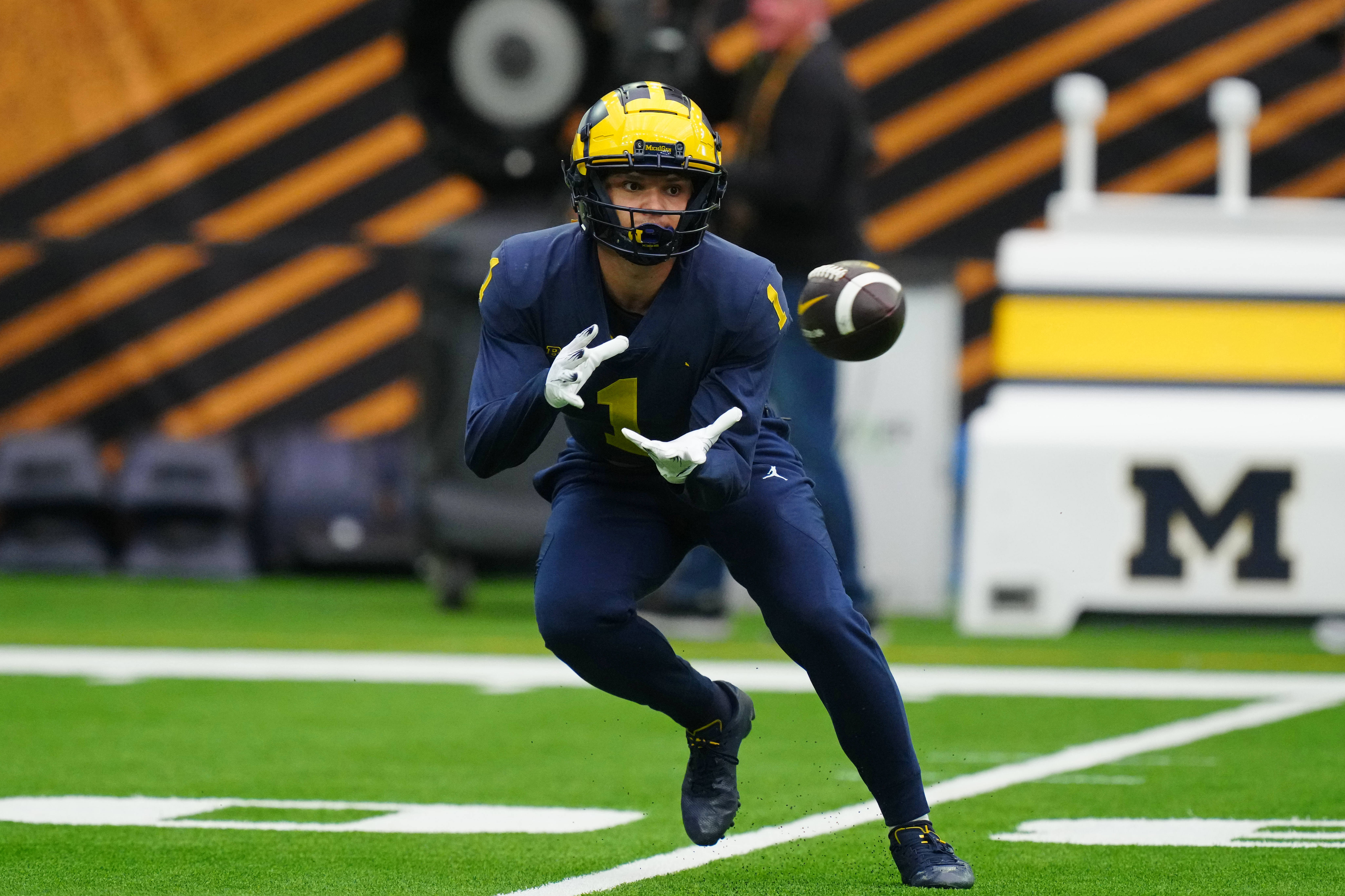Jan 6, 2024; Houston, TX, USA; Michigan Wolverines wide receiver Roman Wilson (1) catches the ball during a practice session before the College Football Playoff national championship game against the Washington Huskies at NRG Stadium. Mandatory Credit: Kirby Lee-USA TODAY Sports