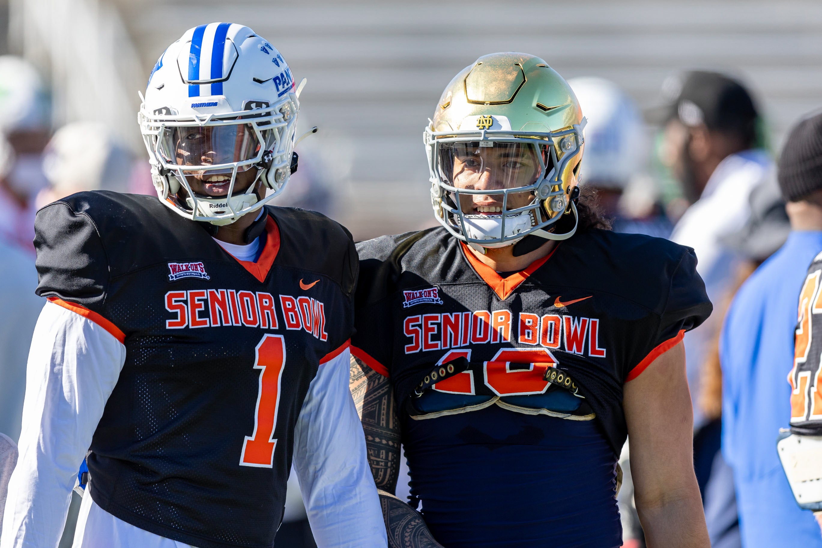 National linebacker Jontrey Hunter of Georgia State (1) and National edge Marist Liufau of Notre Dame (18) during practice for the National team at Hancock Whitney Stadium.