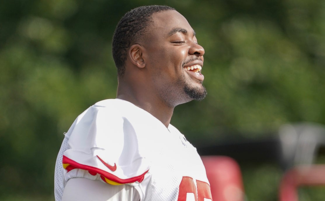 Jul 27, 2022; St. Joseph, MO, USA; Kansas City Chiefs defensive tackle Chris Jones (95) laughs with team mates during training camp at Missouri Western University.