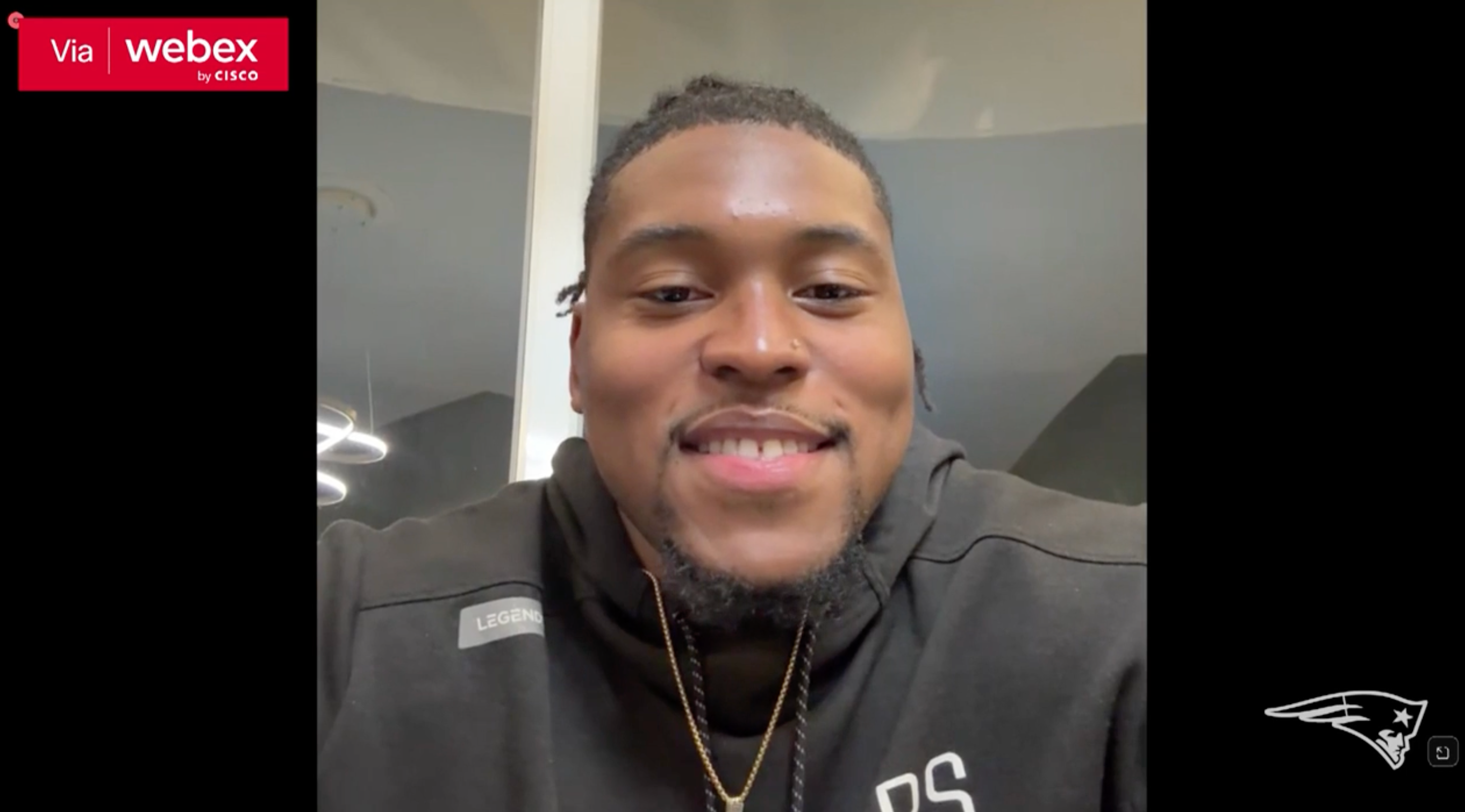 Caedan Wallace speaks with reporters after getting drafted by the New England Patriots.