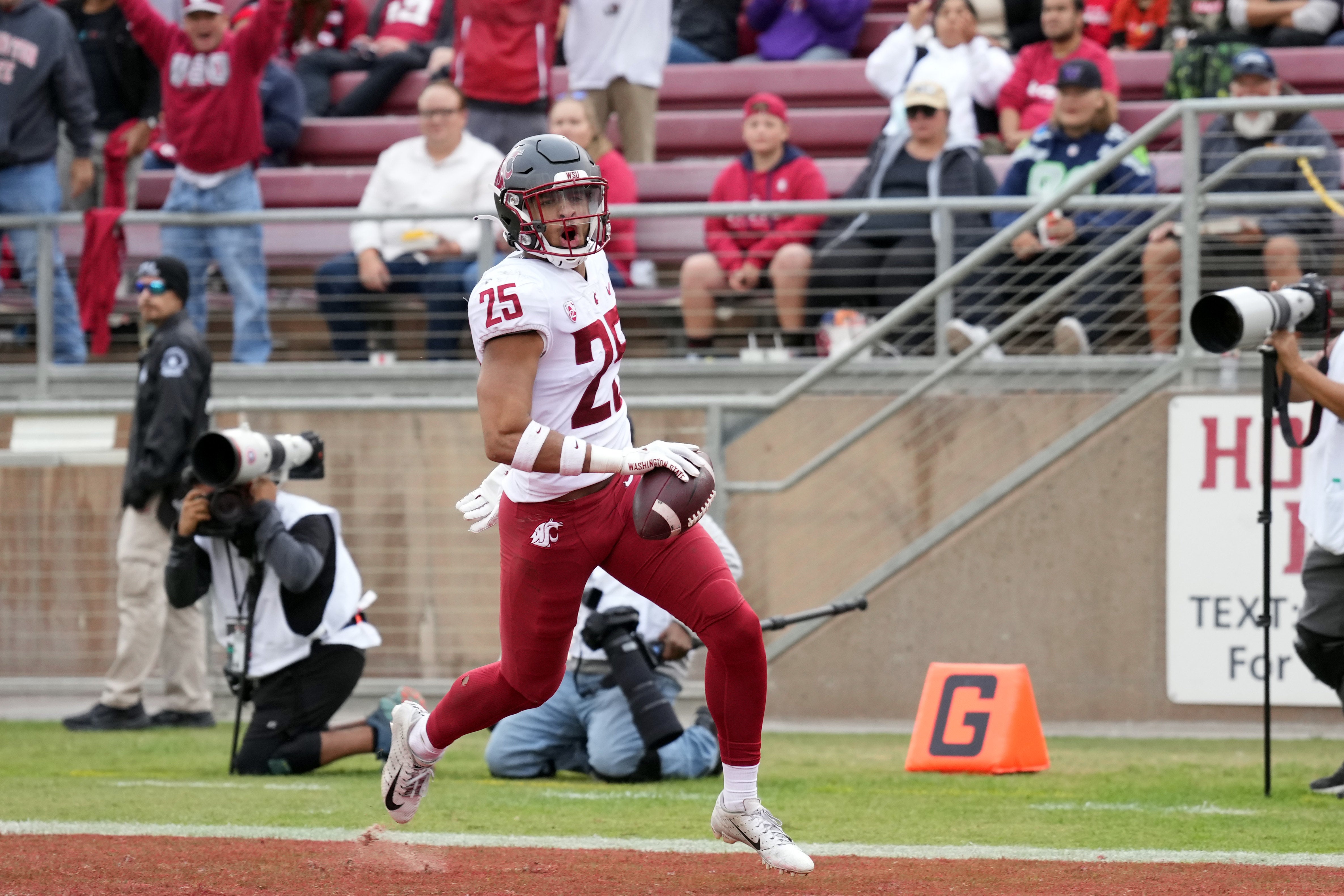 Nov 5, 2022; Stanford, California, USA; Washington State Cougars defensive back Jaden Hicks (25) reacts after scoring a touchdown against the Stanford Cardinal during the second quarter at Stanford Stadium.
