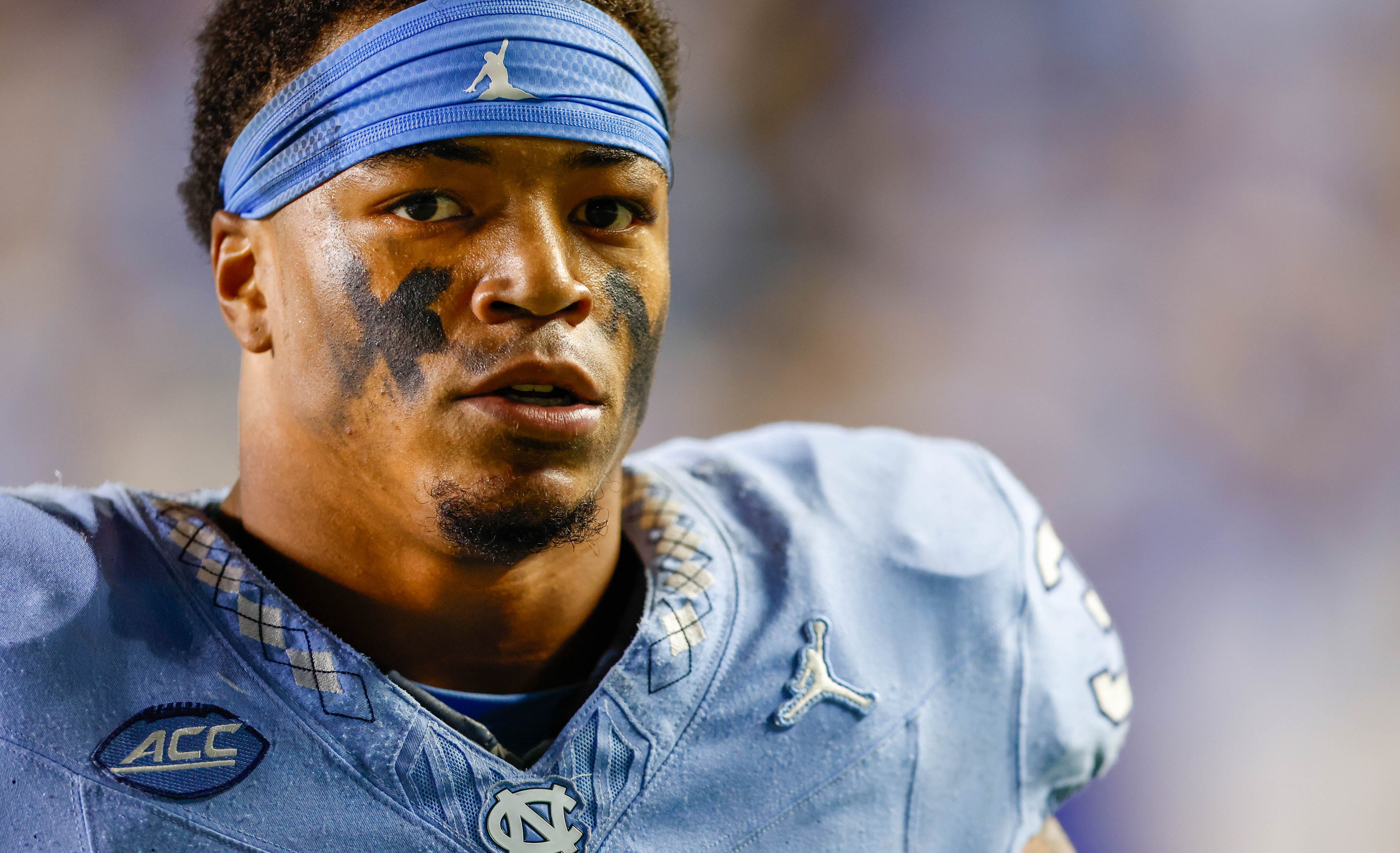 North Carolina Tar Heels linebacker Cedric Gray (33) stands on the sidelines during a game against the Virginia Cavaliers at Kenan Memorial Stadium. Nell Redmond-USA TODAY Sports