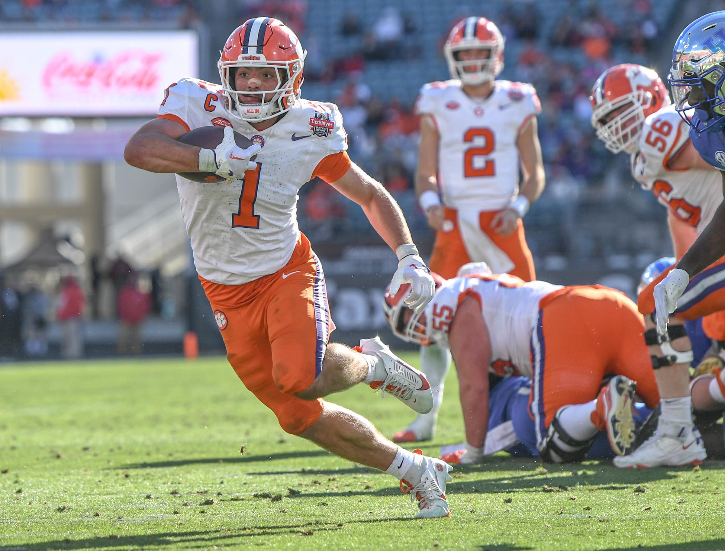 Clemson running back Will Shipley (1) runs during the fourth quarter of the TaxSlayer Gator Bowl at EverBank Stadium in Jacksonville, Florida, Friday, December 29, 2023. Clemson won 38-35.