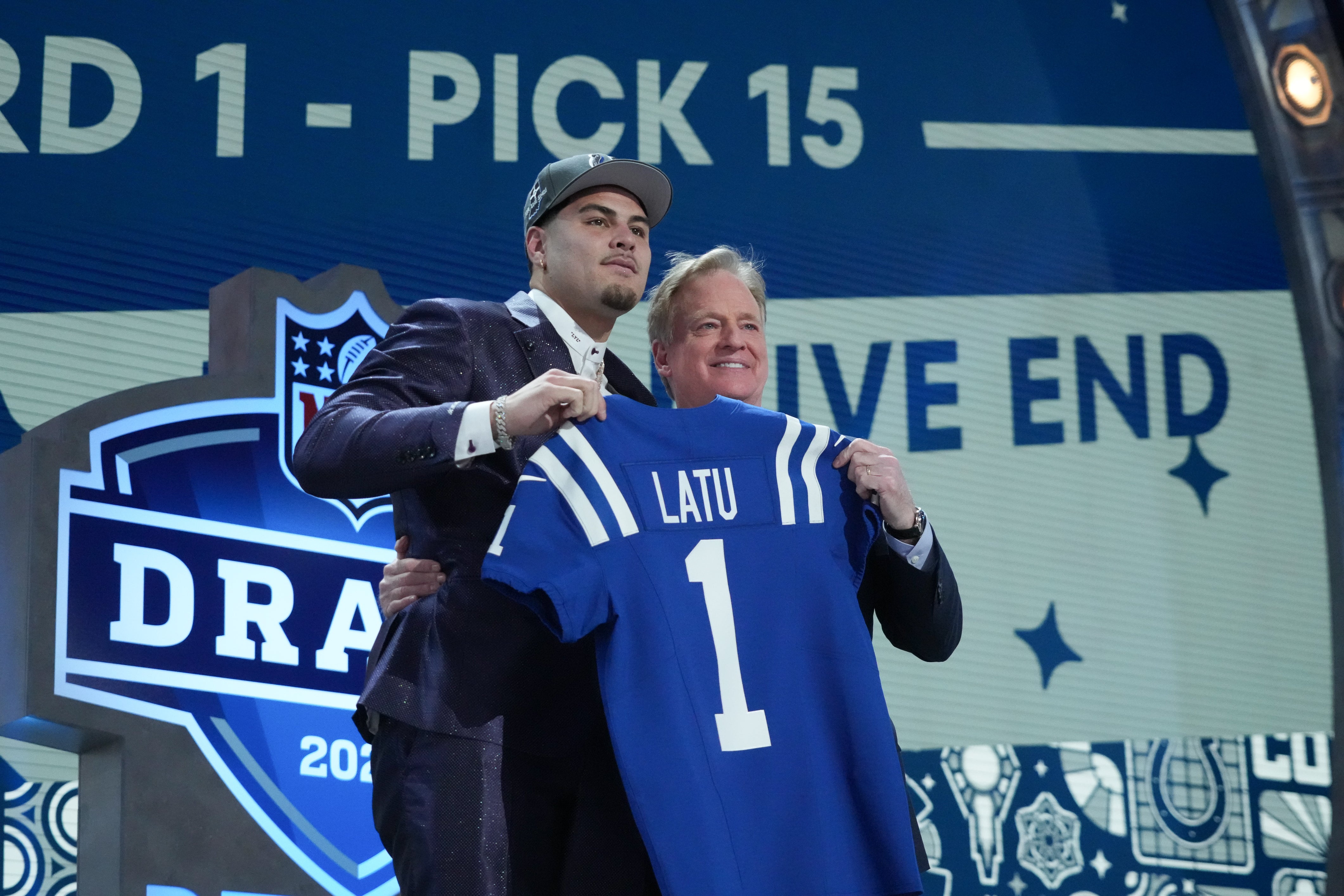 Apr 25, 2024; Detroit, MI, USA; UCLA Bruins defensive lineman Laiatu Latu poses with NFL commissioner Roger Goodell after being selected by the Indianapolis Colts as the No. 15 pick in the first round of the 2024 NFL Draft at Campus Martius Park and Hart Plaza.