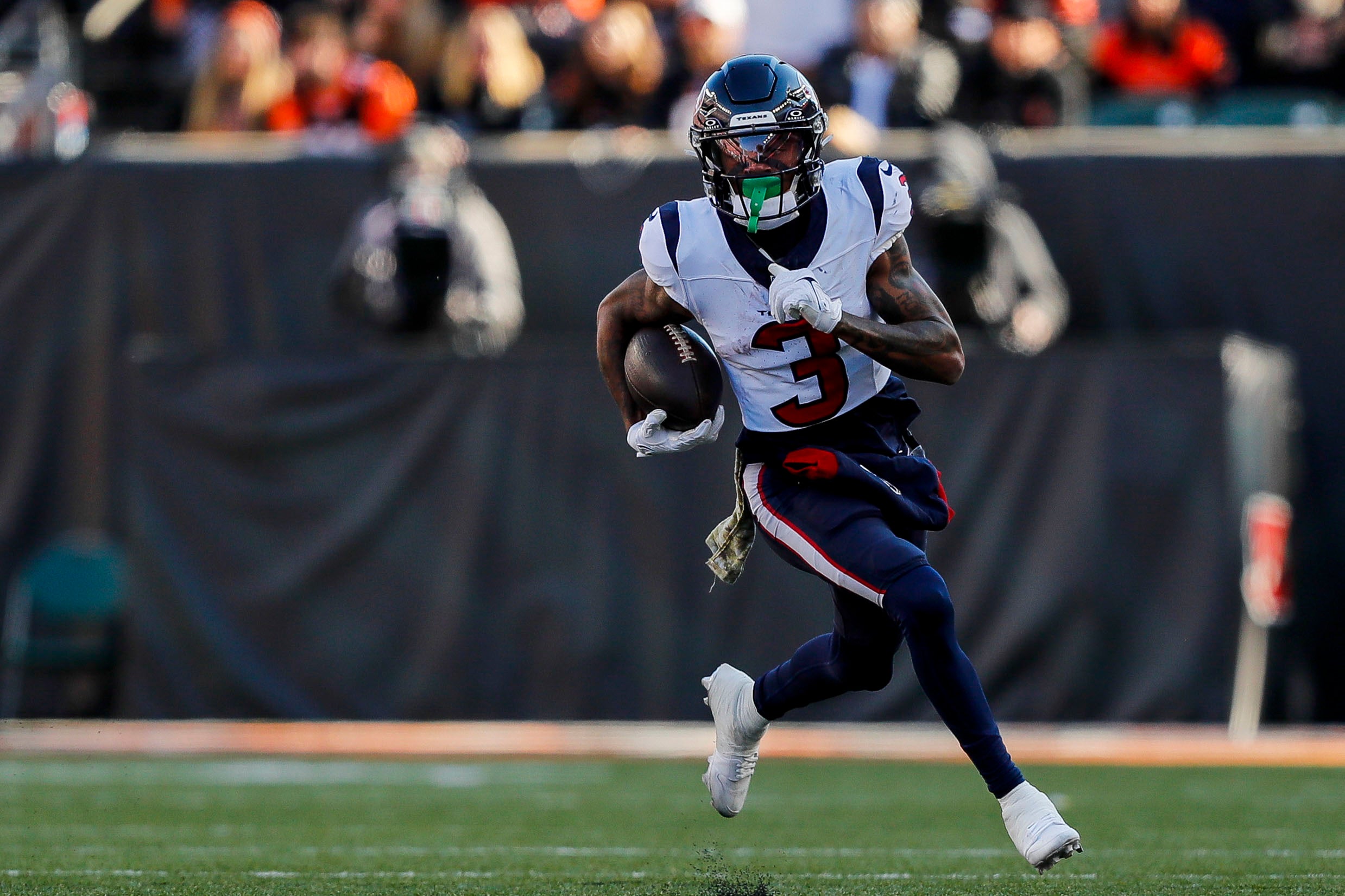 Nov 12, 2023; Cincinnati, Ohio, USA; Houston Texans wide receiver Tank Dell (3) runs with the ball against the Cincinnati Bengals in the first half at Paycor Stadium.