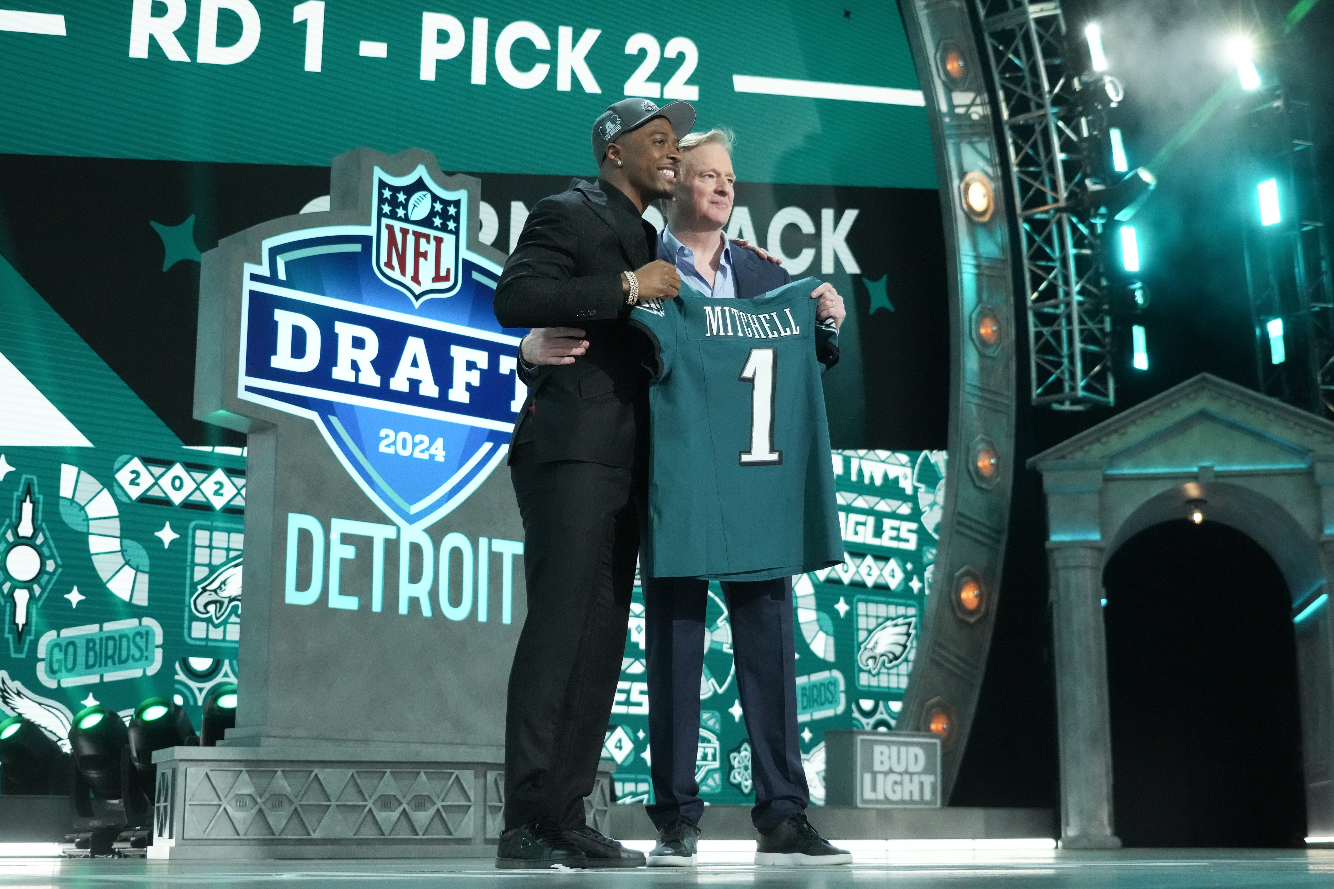 Toledo Rockets cornerback Quinyon Mitchell poses with NFL commissioner Roger Goodell after being selected by the Philadelphia Eagles as the No. 22 pick in the first round of the 2024 NFL Draft at Camp.