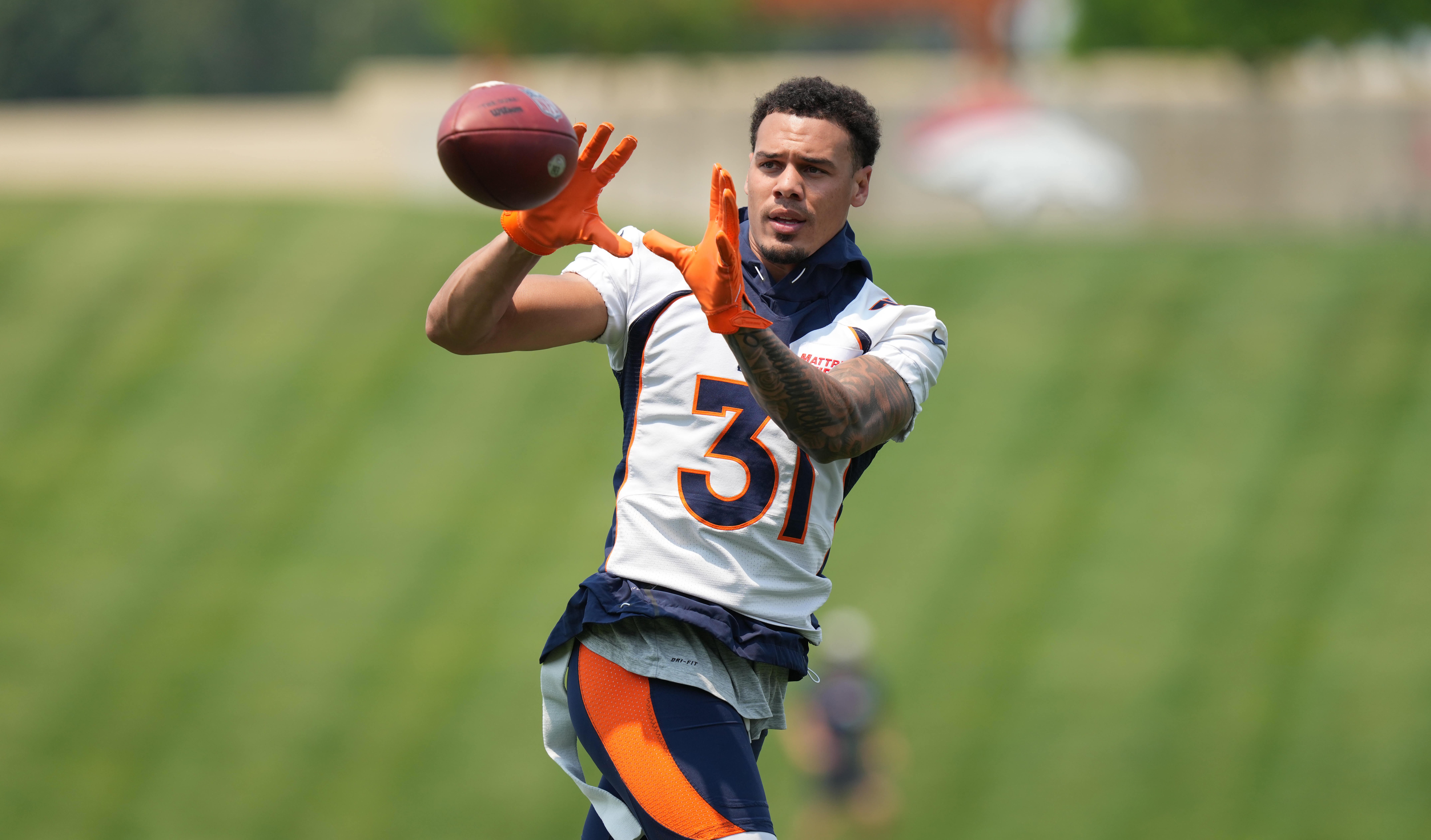 Denver Broncos safety Justin Simmons (31) during mini camp drills at the UCHealth Training Center. Ron Chenoy-USA TODAY Sports