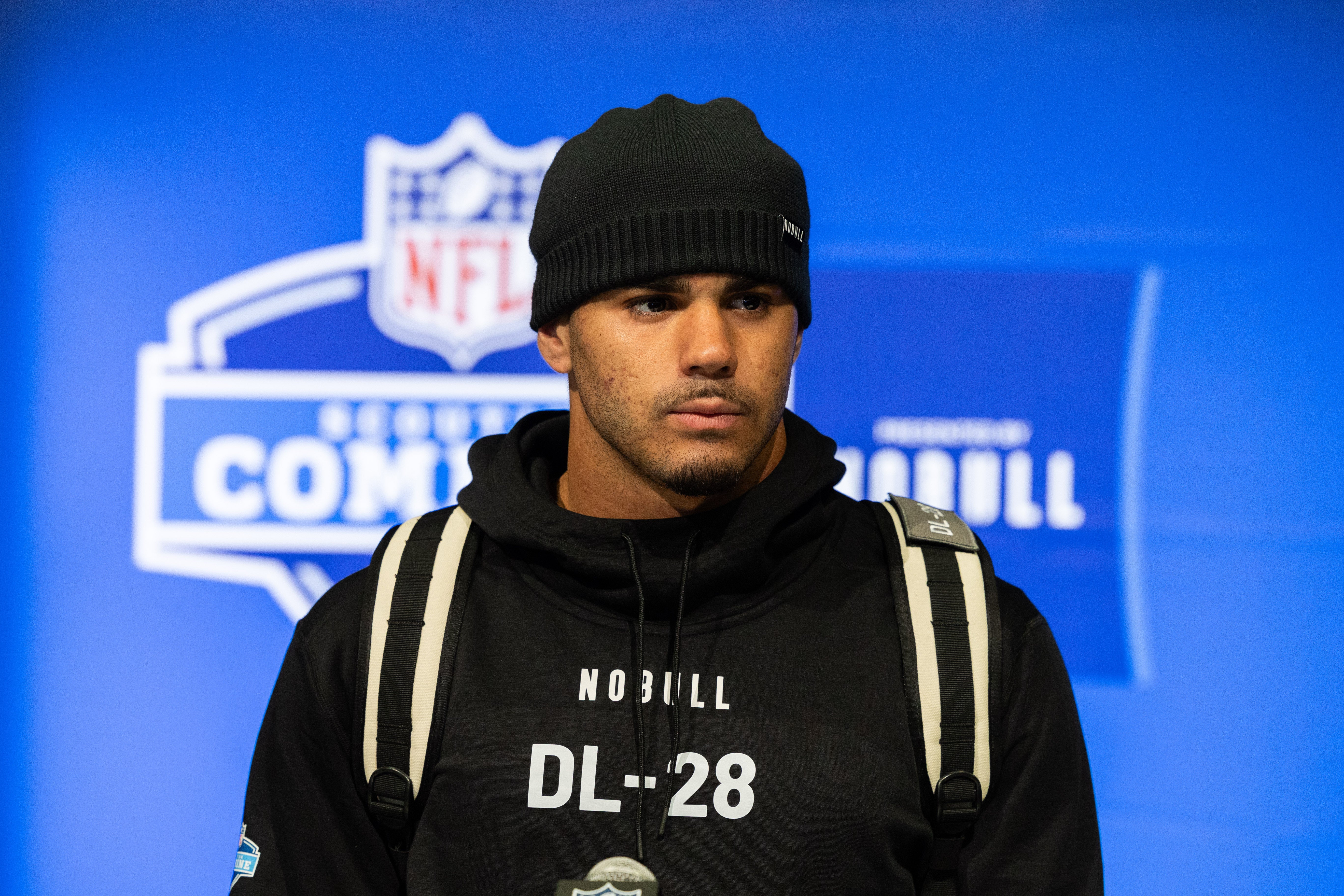 Feb 28, 2024; Indianapolis, IN, USA; Kansas defensive lineman Austin Booker (DL28) talks to the media at the 2024 NFL Combine at Indiana Convention Center.