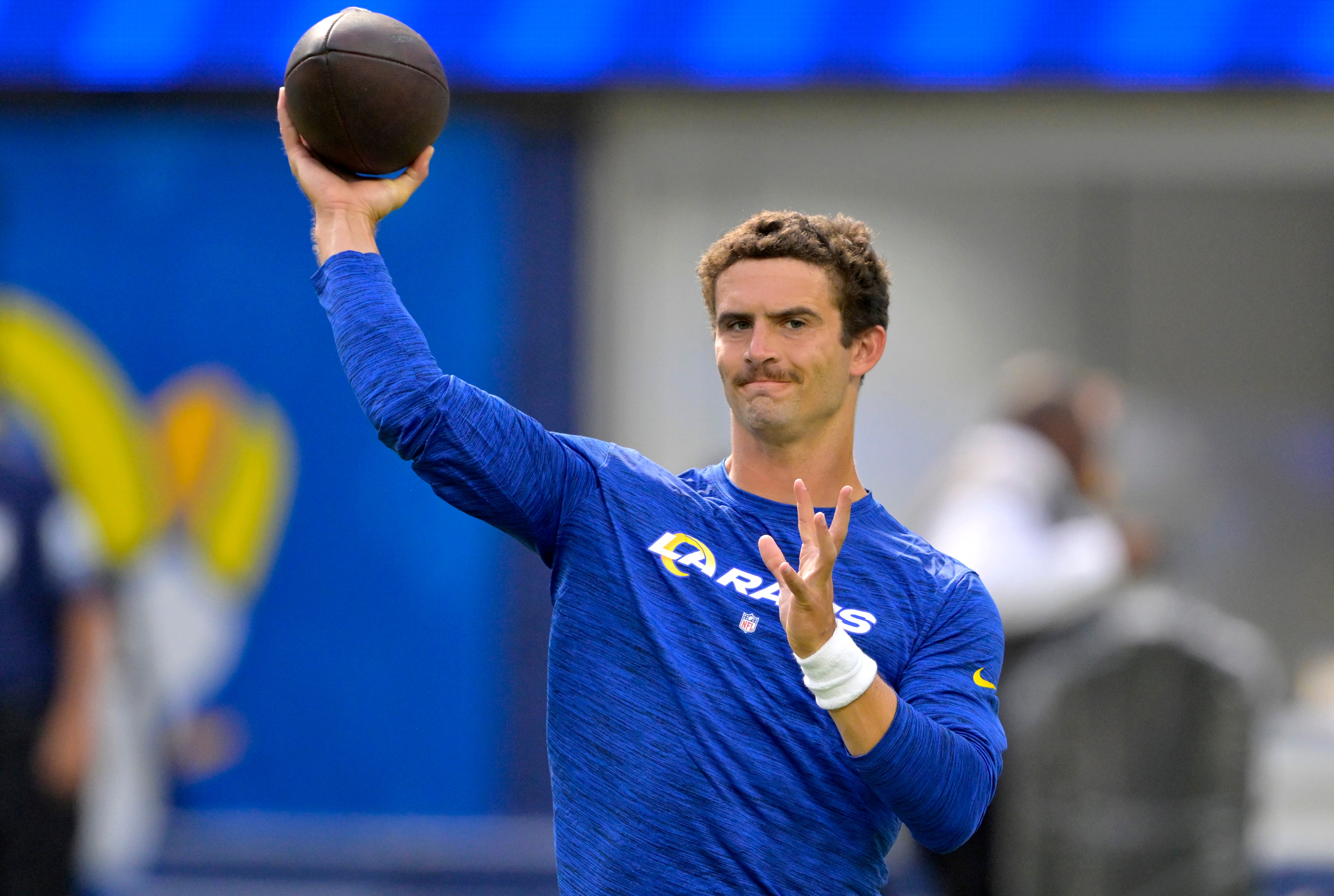 Aug 12, 2023; Inglewood, California, USA; Los Angeles Rams quarterback Stetson Bennett (13) warms up prior to the game against the Los Angeles Chargers at SoFi Stadium.
