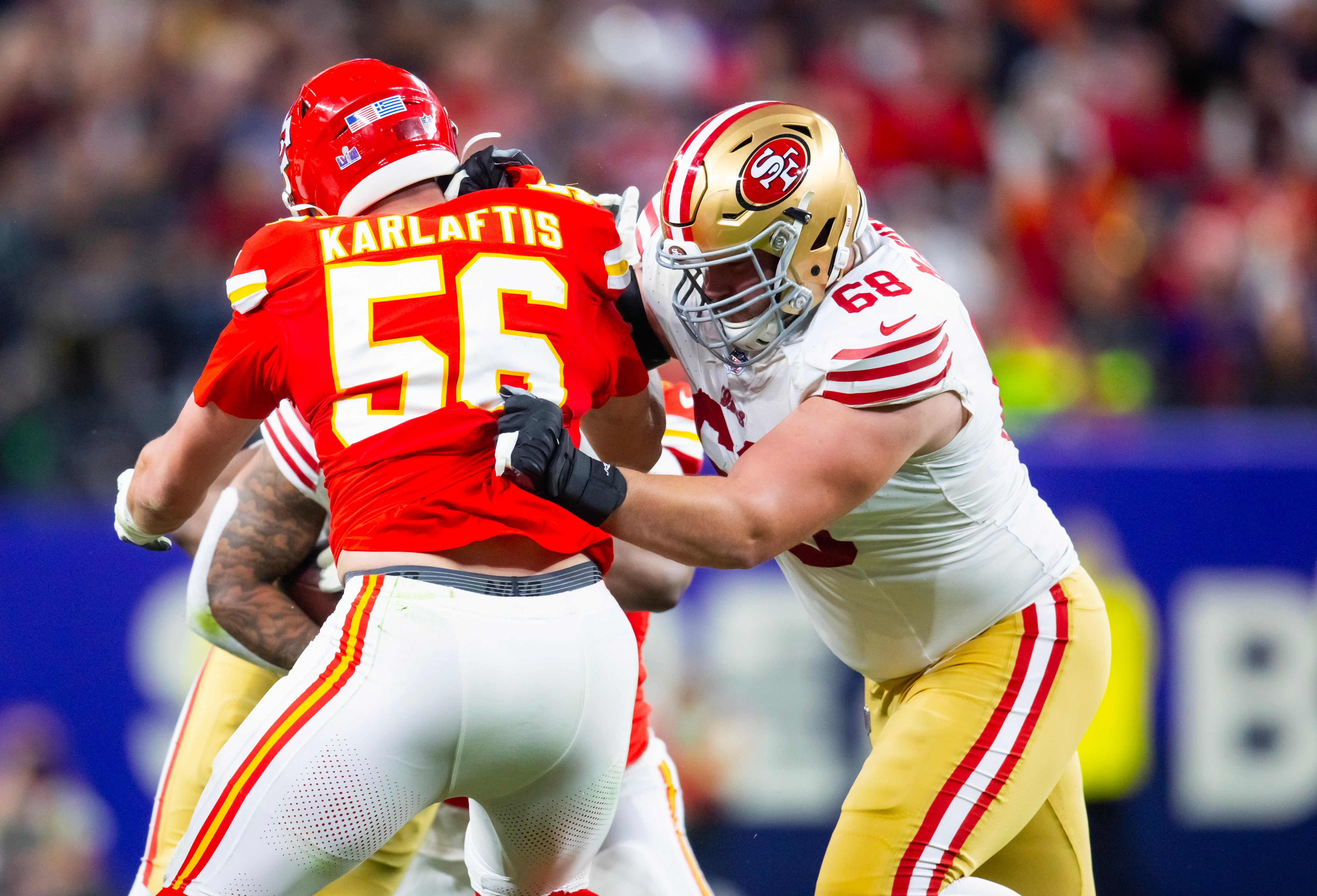 Feb 11, 2024; Paradise, Nevada, USA; San Francisco 49ers offensive tackle Colton McKivitz (68) against Kansas City Chiefs defensive end George Karlaftis (56) in Super Bowl LVIII at Allegiant Stadium.