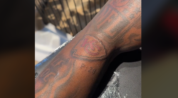 Xavier Worthy's Chiefs tattoo.