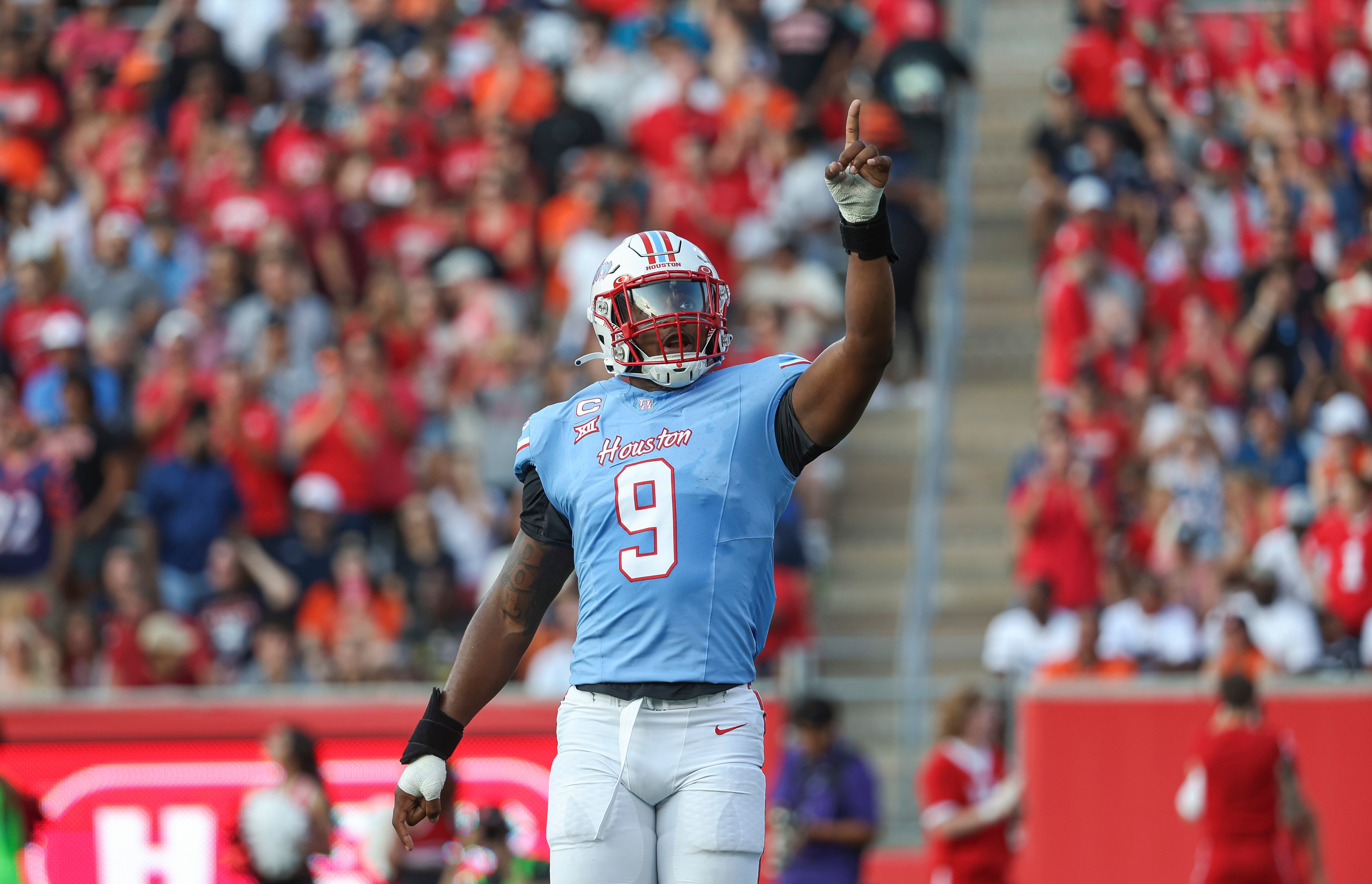 Sep 2, 2023; Houston, Texas, USA; Houston Cougars defensive lineman Nelson Ceaser (9) reacts after a play during the first quarter against the UTSA Roadrunners at TDECU Stadium.