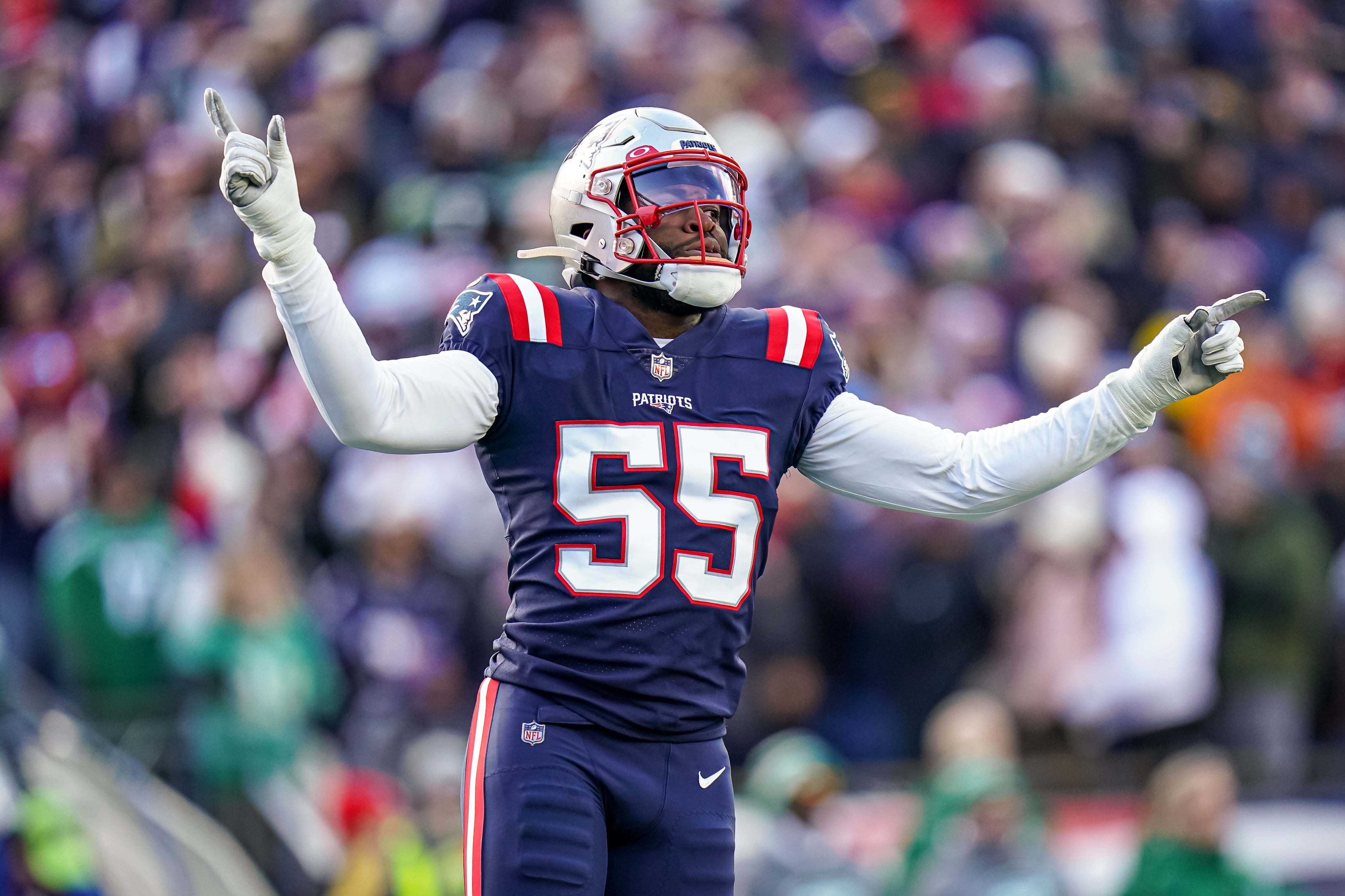 Nov 20, 2022; Foxborough, Massachusetts, USA; New England Patriots linebacker Josh Uche (55) react on the field after a play against the New York Jets in the first half at Gillette Stadium.