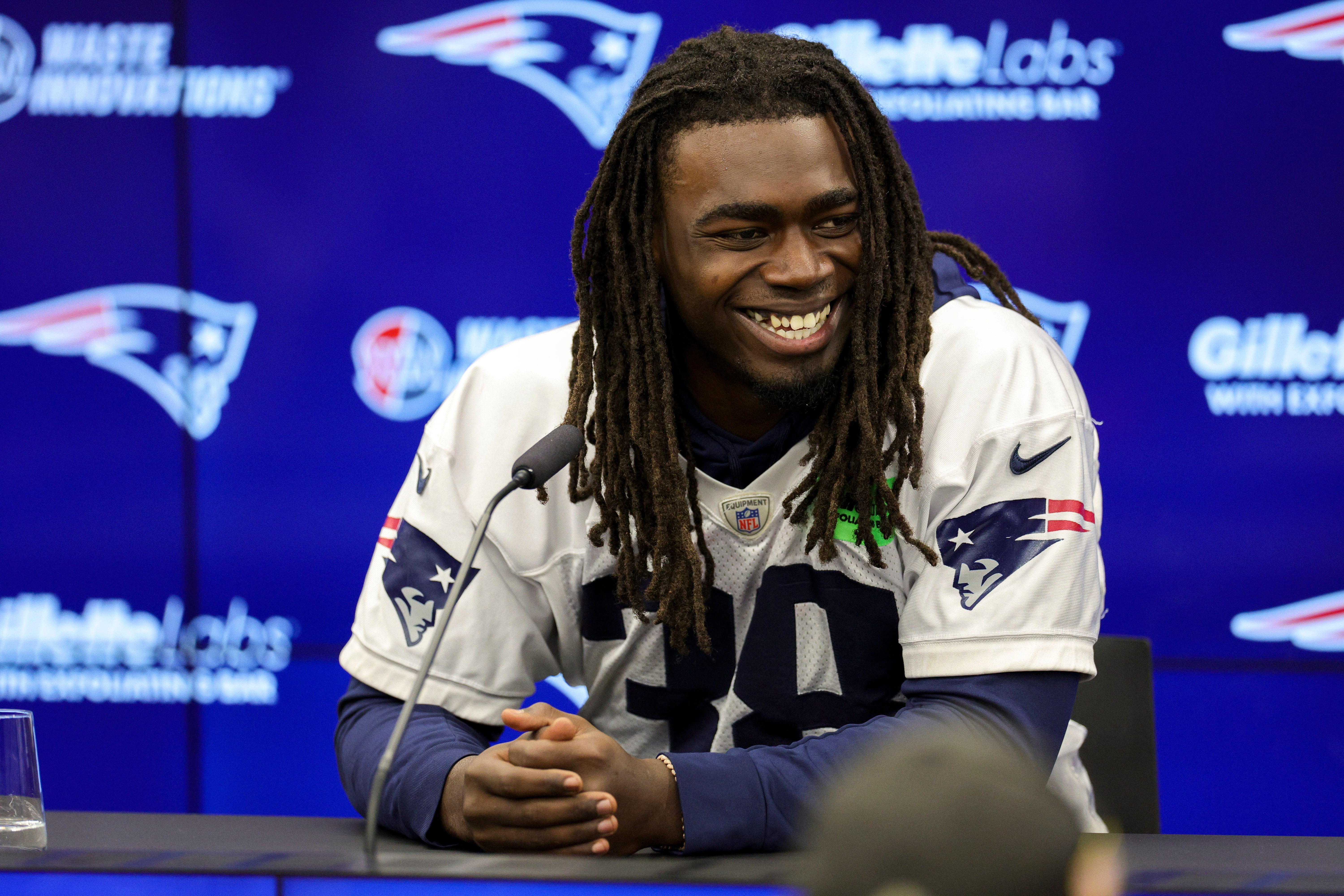 Nov 10, 2023; Frankfurt, Germany; New England Patriots running back Rhamondre Stevenson (38) speaks to the media before an NFL International Series practice at the Deutcher Fussball-Bund facility.