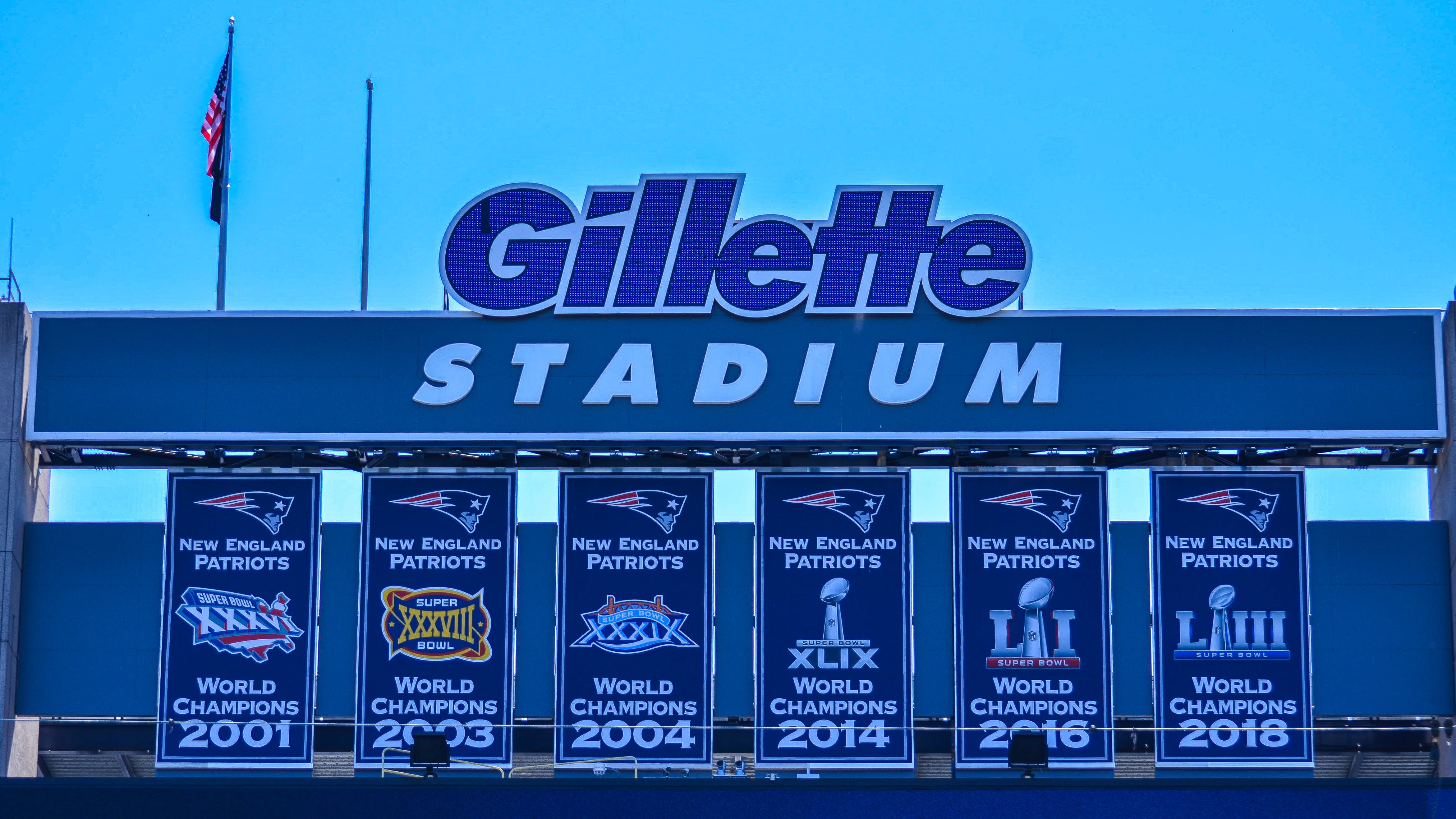 New England Patriots Super Bowl banners hanging on the field at Gillette Stadium