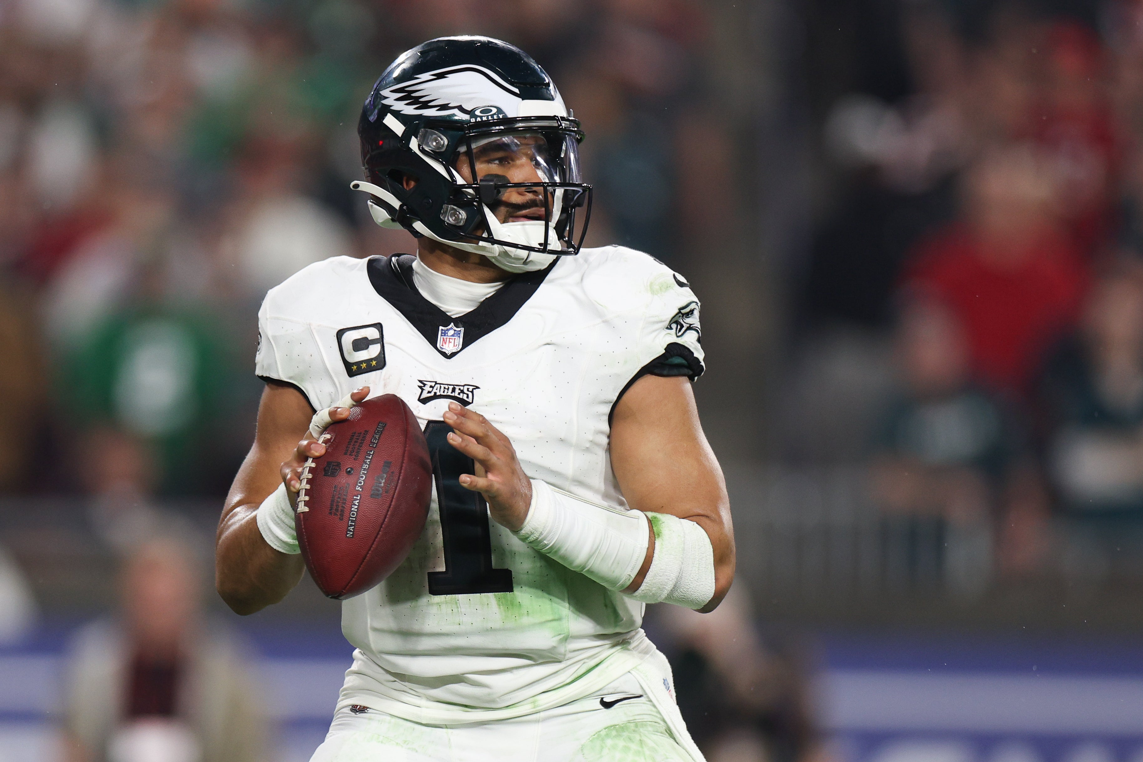 Philadelphia Eagles quarterback Jalen Hurts (1) looks to throw against the Tampa Bay Buccaneers during the second half of a 2024 NFC wild card game at Raymond James Stadium.