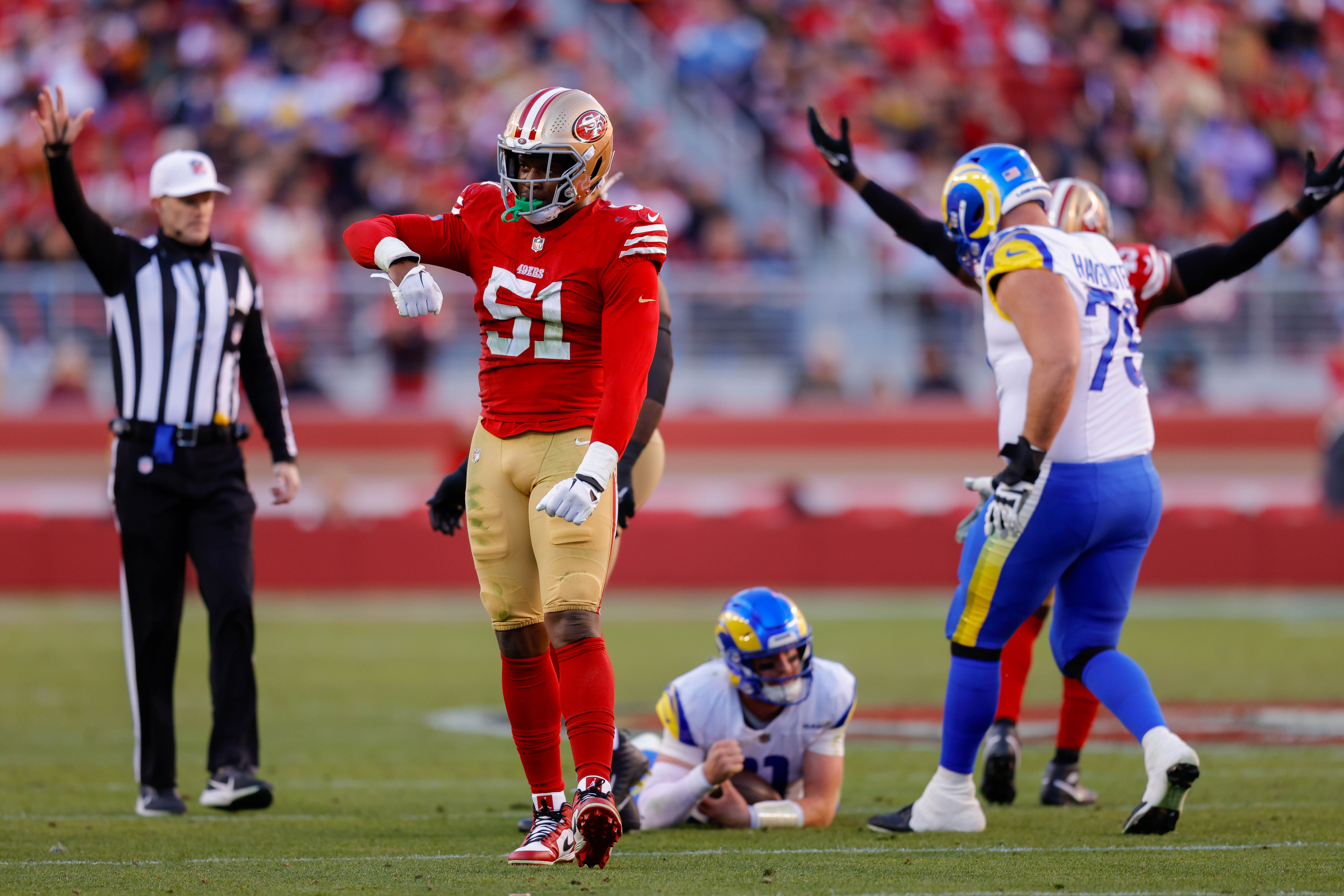 Jan 7, 2024; Santa Clara, California, USA; San Francisco 49ers defensive end Robert Beal Jr. (51) celebrates after a tackle against the Los Angeles Rams during the third quarter at Levi's Stadium.