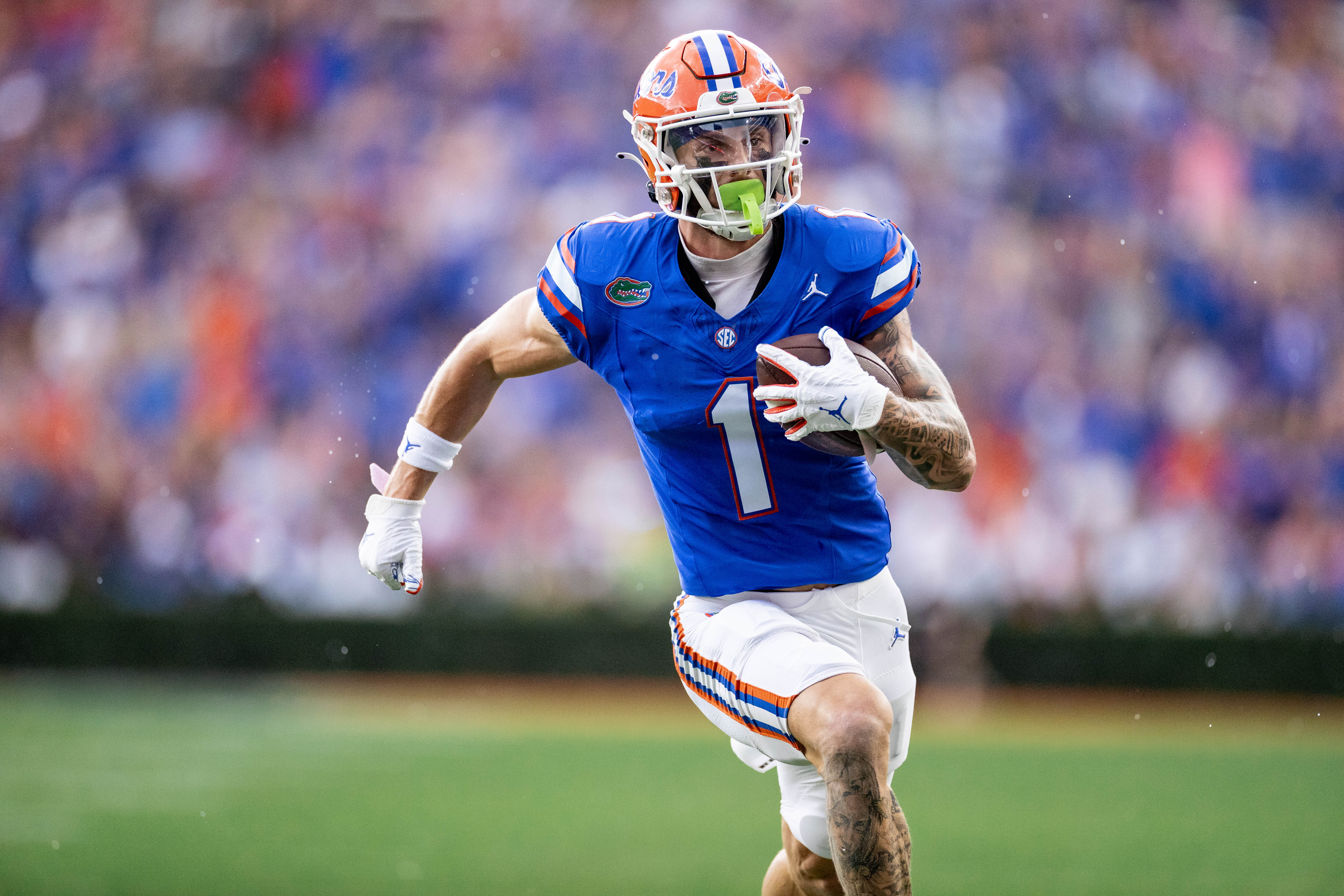 Florida Gators wide receiver Ricky Pearsall (1) rushes with the ball for a touchdown during the first half against the Vanderbilt Commodores at Steve Spurrier Field at Ben Hill Griffin Stadium in Gainesville, FL on Saturday, October 7, 2023.