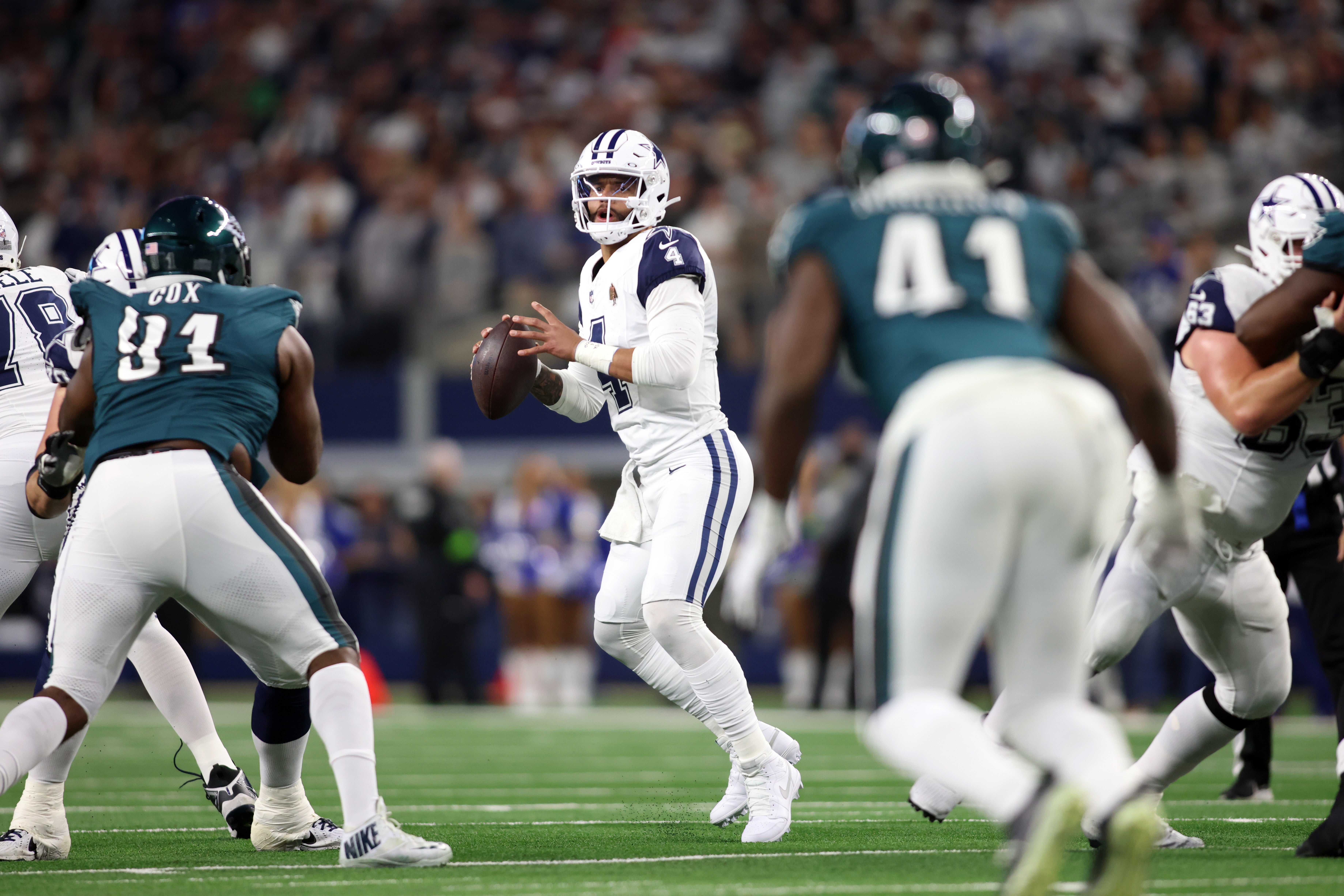 Dallas Cowboys quarterback Dak Prescott (4) throws a pass in the first quarter against the Philadelphia Eagles at AT&T Stadium.