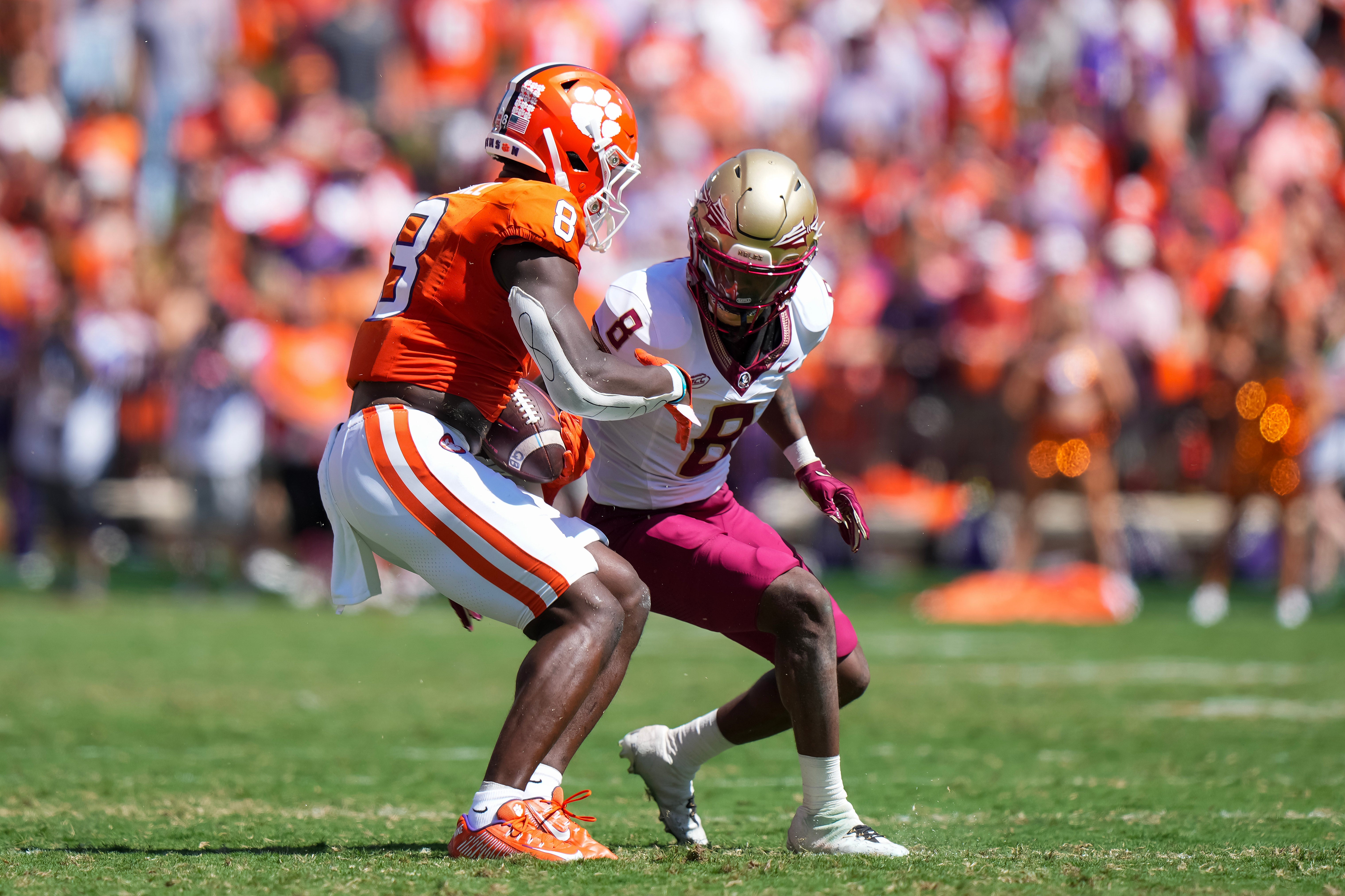 Sep 23, 2023; Clemson, South Carolina, USA; Clemson Tigers wide receiver Adam Randall (8) is defended by Florida State Seminoles defensive back Renardo Green (8) in the second half at Memorial Stadium.