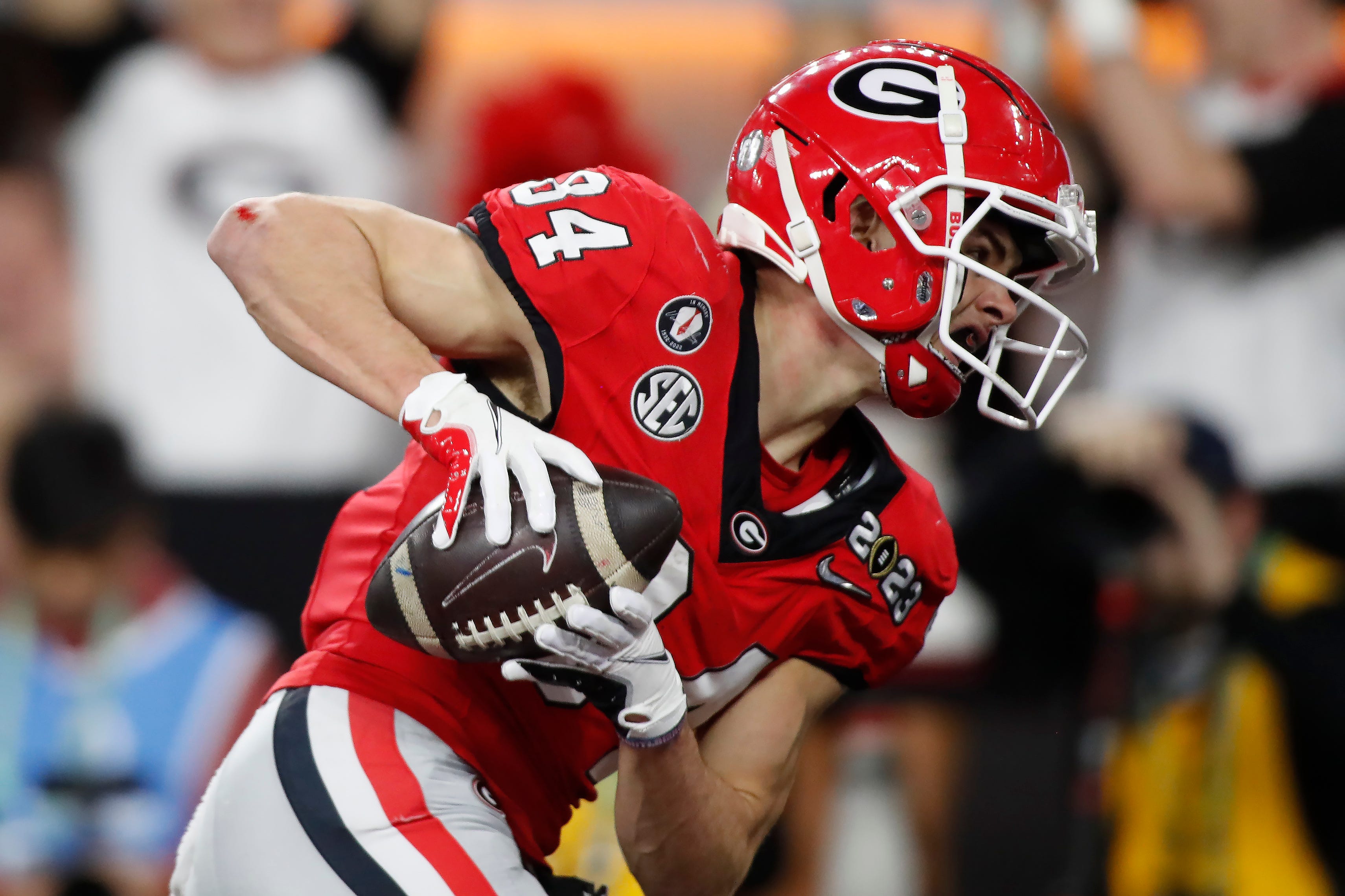 Georgia wide receiver Ladd McConkey (84) scores a touchdown during the first half of the NCAA College Football National Championship game between TCU and Georgia on Monday, Jan. 9, 2023, in Inglewood.