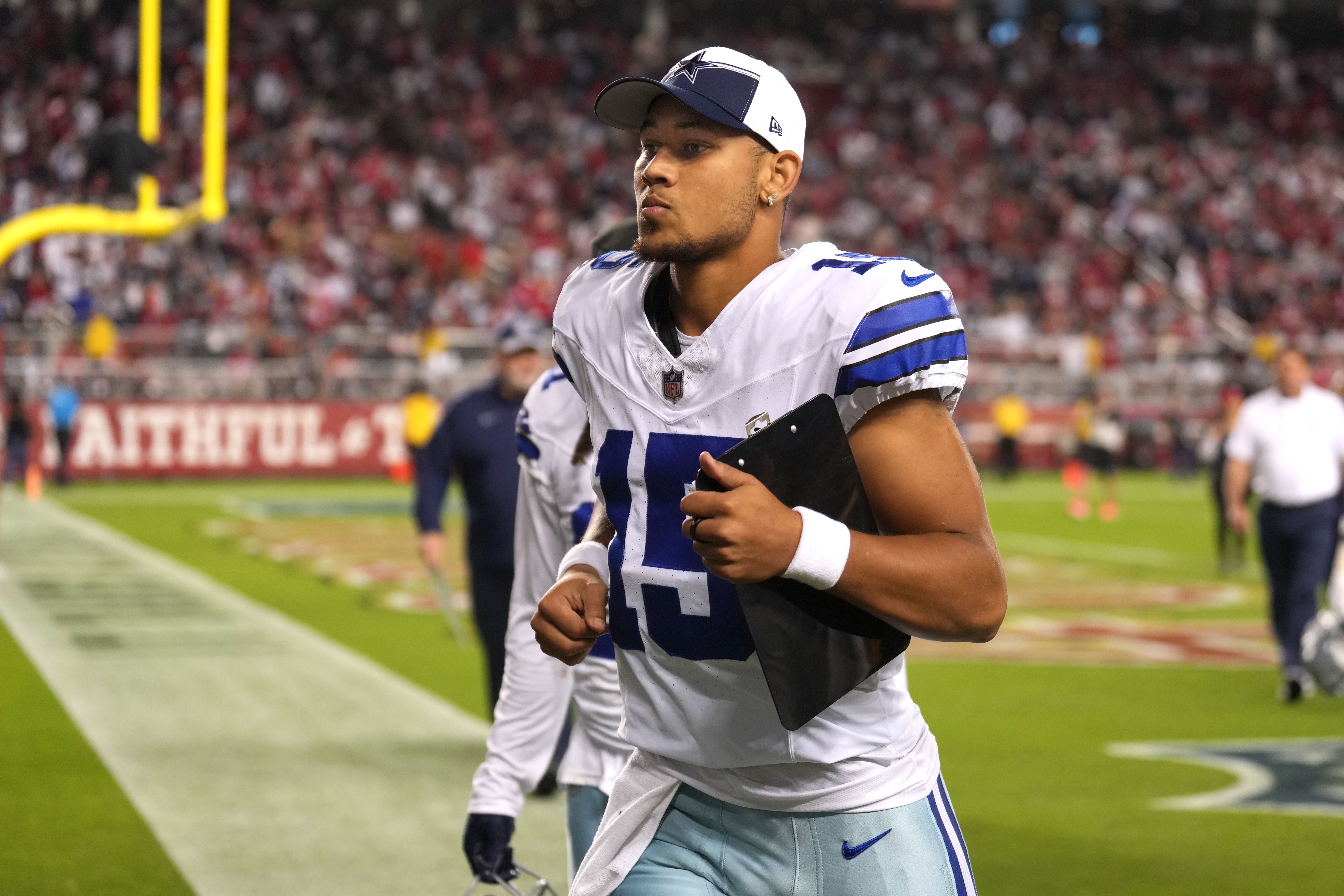 Oct 8, 2023; Santa Clara, California, USA; Dallas Cowboys quarterback Trey Lance (15) jogs off of the field during halftime against the San Francisco 49ers at Levi's Stadium.