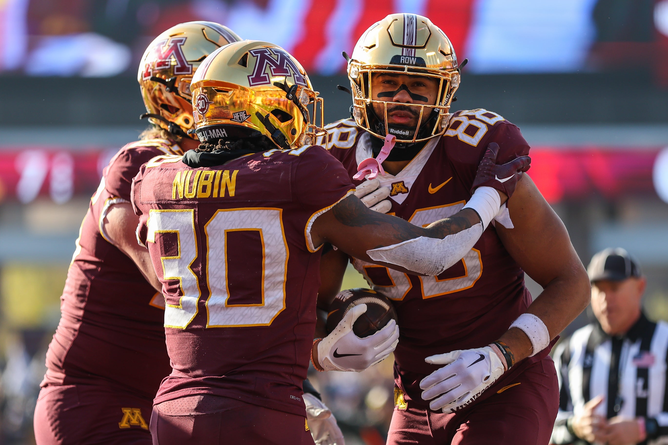Minnesota Golden Gophers tight end Brevyn Spann-Ford (88) celebrates his touchdown with running back Jordan Nubin (30) during the first half against the Illinois Fighting Illini at Huntington Bank Stadium.