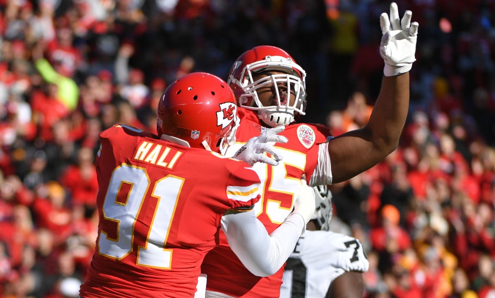 Dec 10, 2017; Kansas City, MO, USA; Kansas City Chiefs outside linebacker Tamba Hali (91) and defensive end Chris Jones (95) celebrate after a sack during the game against the Oakland Raiders at Arrowhead Stadium.