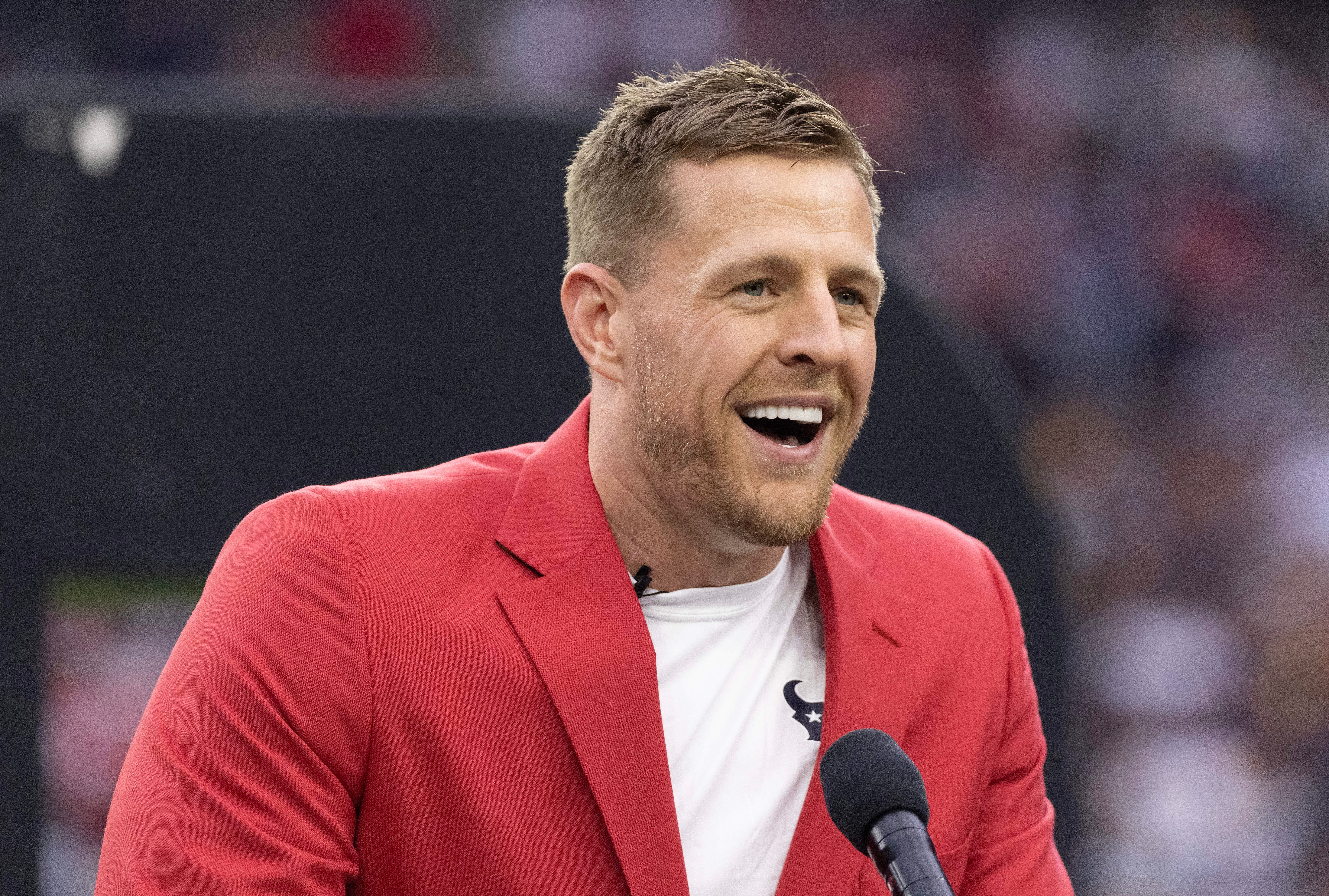 Oct 1, 2023; Houston, Texas, USA; Former Houston Texans JJ Watt speaks to the fans during his Ring Of Honor Ceremony at halftime during the game between the Texans and Pittsburgh Steelers at NRG Stadium.