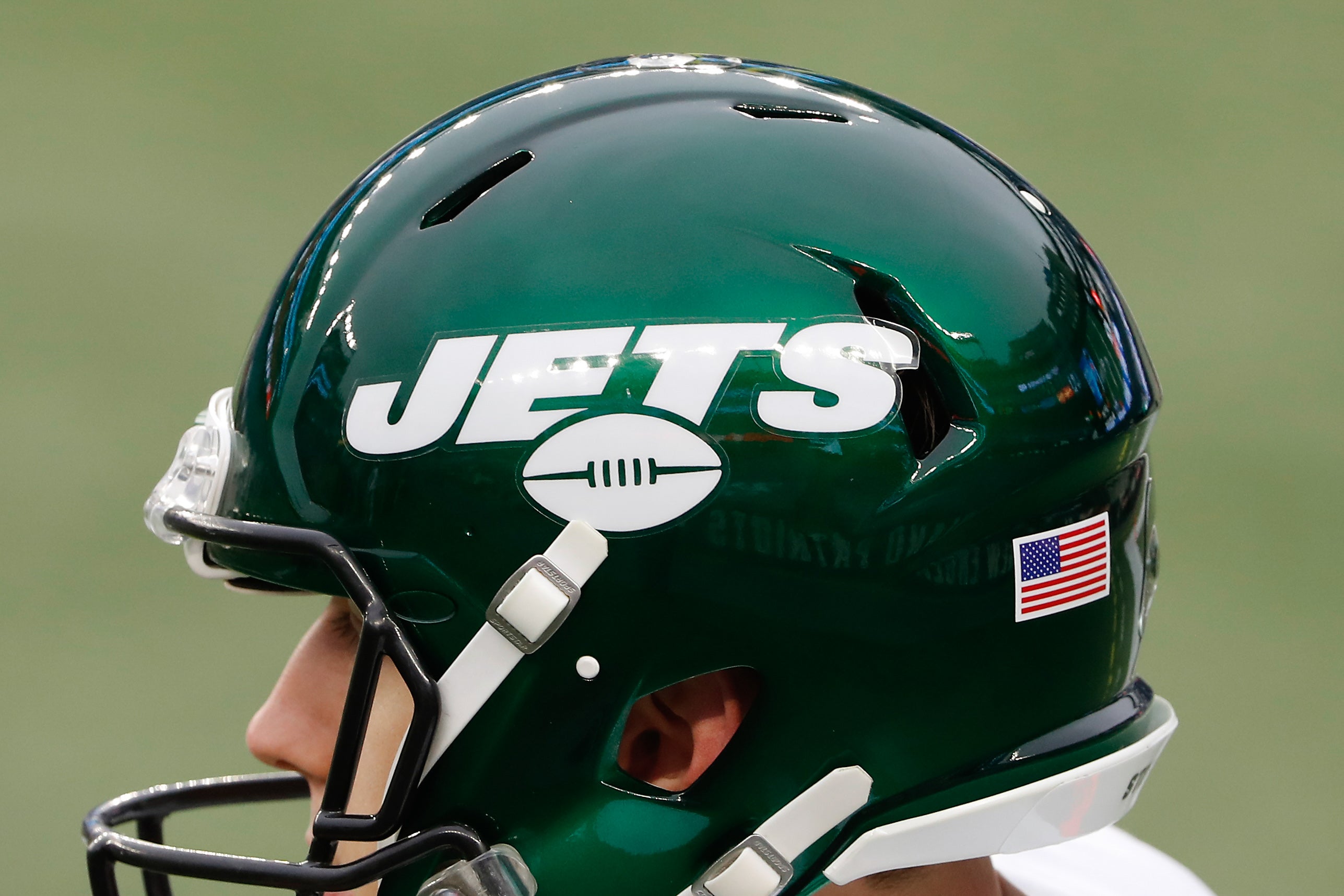 Jan 3, 2021; Foxborough, Massachusetts, USA; The New York Jets logo is seen on a helmet during the first half of their game against the New England Patriots at Gillette Stadium.