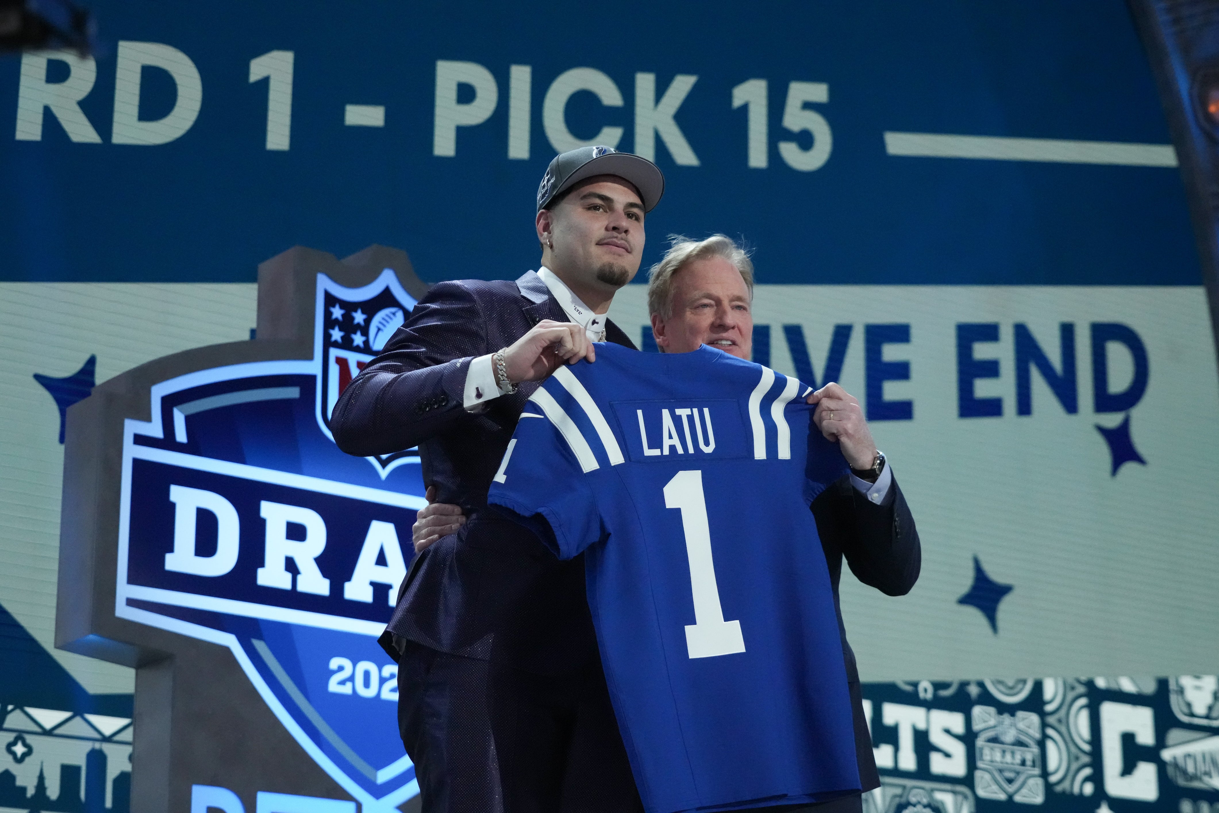 Apr 25, 2024; Detroit, MI, USA; UCLA Bruins defensive lineman Laiatu Latu poses with NFL commissioner Roger Goodell after being selected by the Indianapolis Colts as the No. 15 pick in the first round of the 2024 NFL Draft at Campus Martius Park and Hart Plaza.