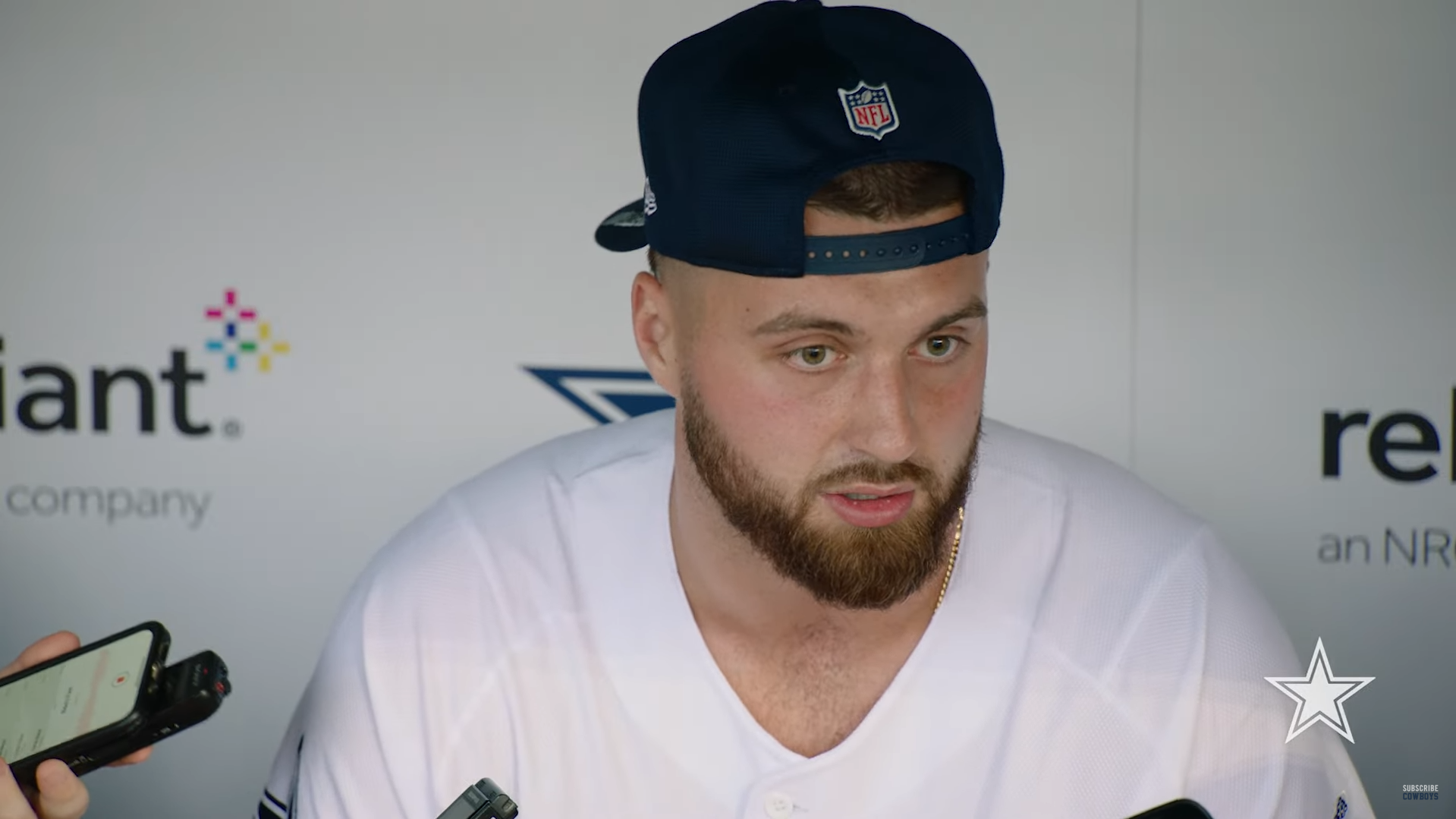 Dallas Cowboys TE Jake Ferguson talks to reporters in May, 2024.