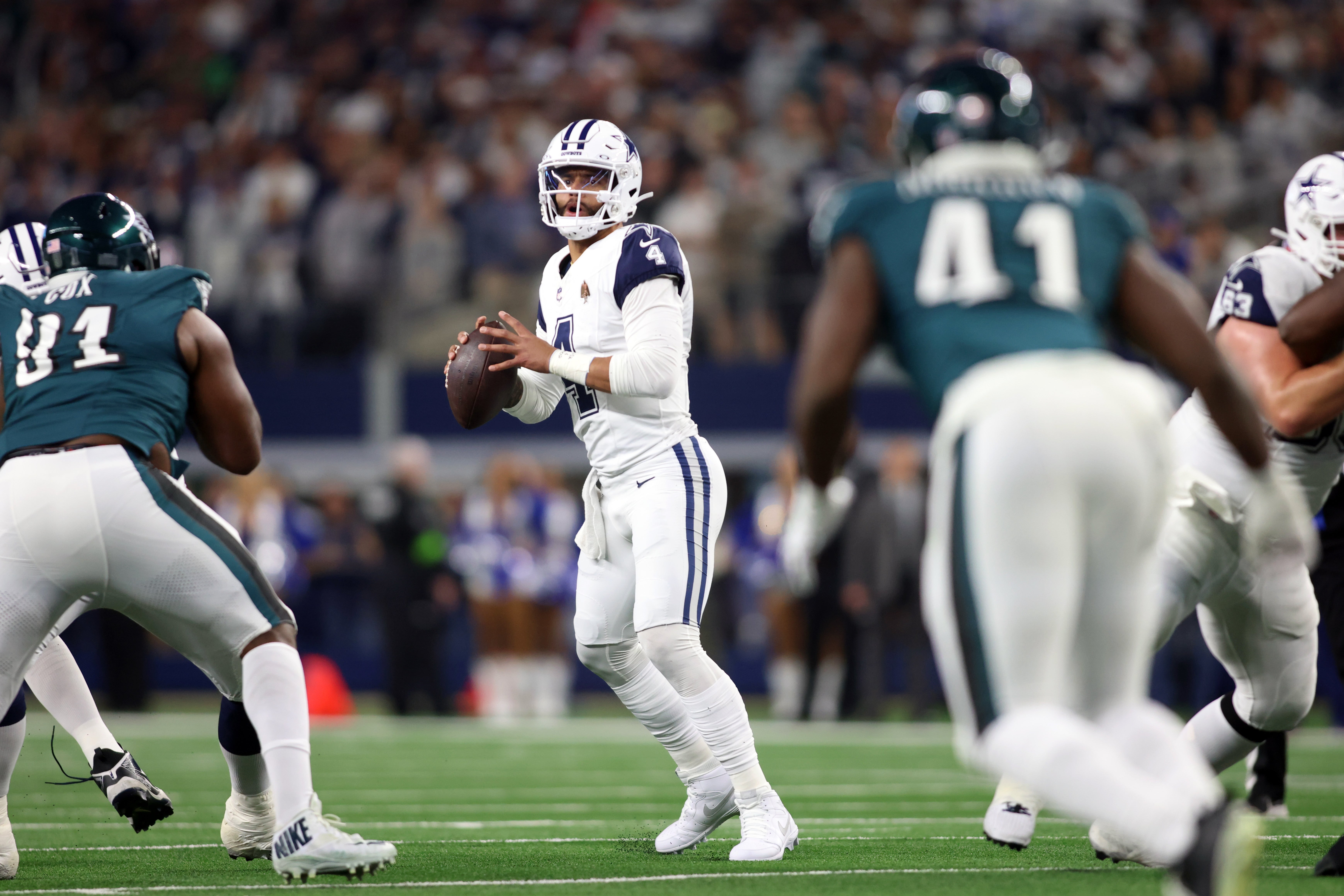 Dallas Cowboys quarterback Dak Prescott (4) throws a pass in the first half against the Philadelphia Eagles at AT&T Stadium.