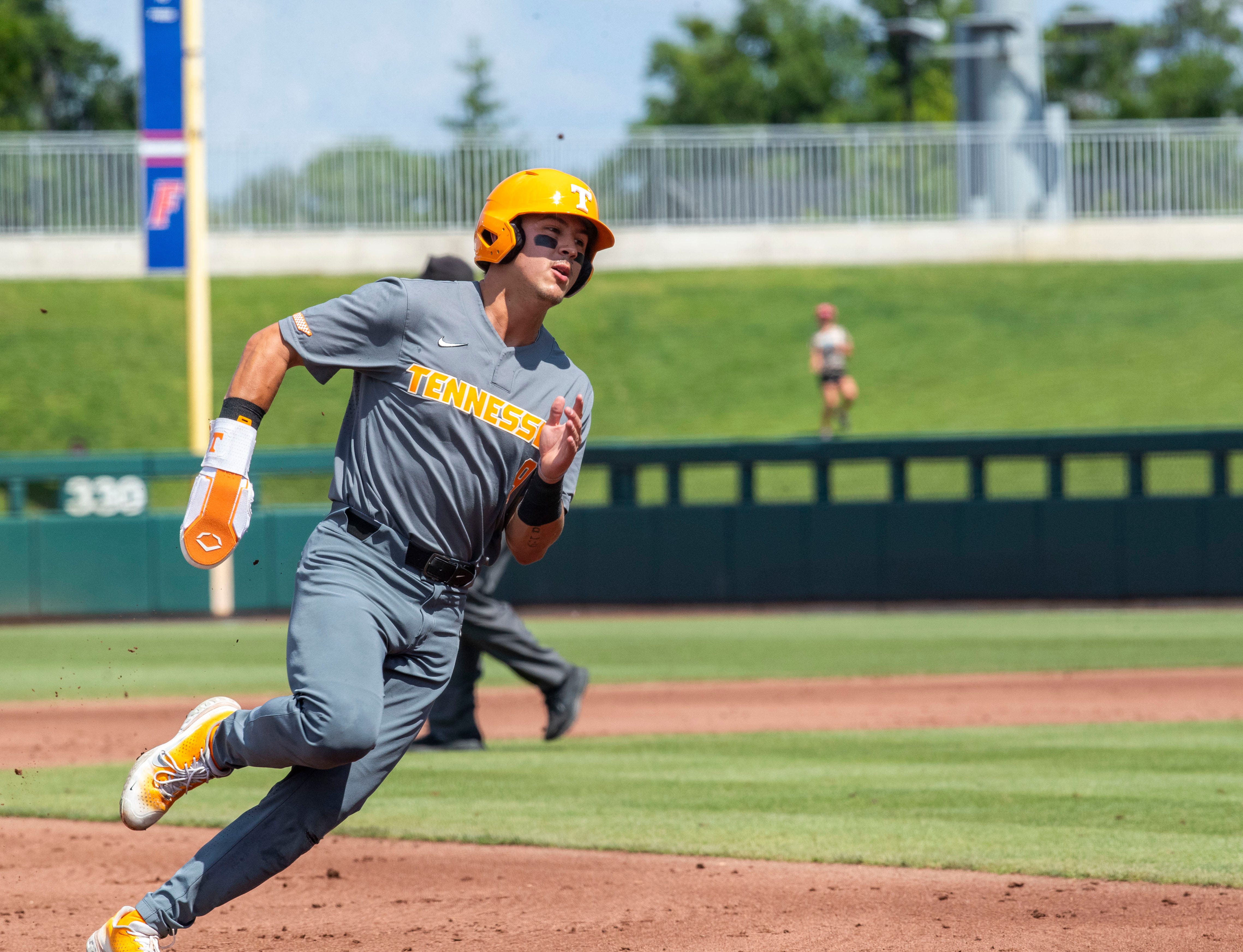 Tennessee's outfielder Hunter Ensley (9) heads to third in the top of the second inning, Friday, May 3, 2024, at Condron Family Ballpark in Gainesville, Florida. The Gators fell to Tennessee 6-2 in the first game of the doubleheader.