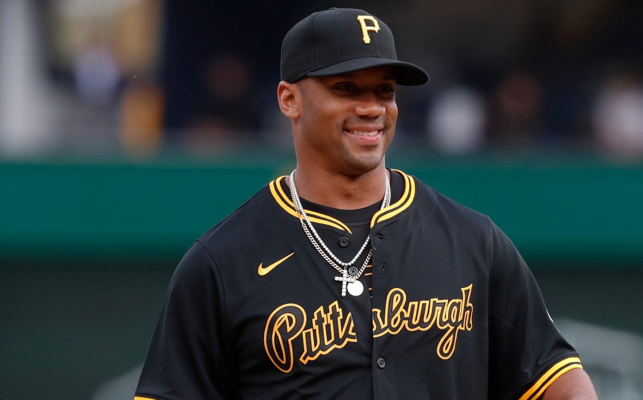 Apr 19, 2024; Pittsburgh, Pennsylvania, USA; Pittsburgh Steelers quarterback Russell Wilson (3) throws out a ceremonial first pitch before the Pittsburgh Pirates host the Boston Red Sox at PNC Park. Mandatory Credit: Charles LeClaire-USA TODAY Sports  