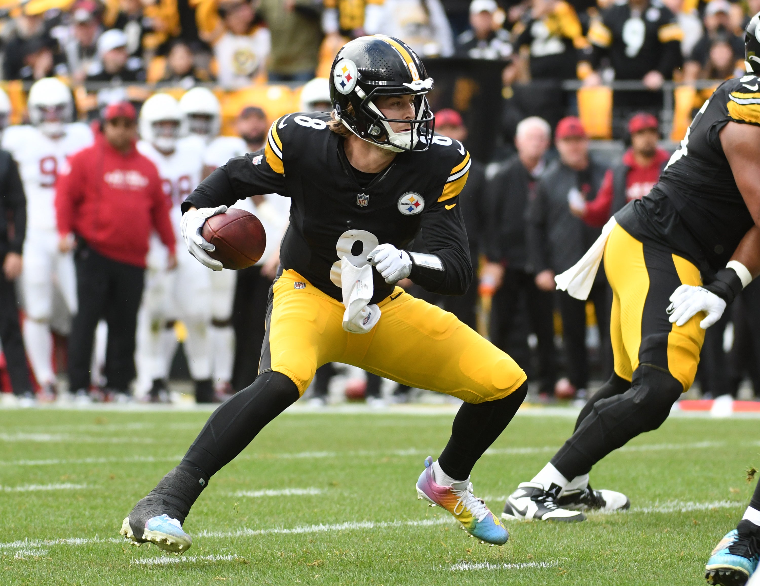 Dec 3, 2023; Pittsburgh, Pennsylvania, USA; Pittsburgh Steelers quarterback Kenny Pickett (8) plays the ball against the Arizona Cardinals during the second quarter at Acrisure Stadium. Mandatory Credit: Philip G. Pavely-USA TODAY Sports