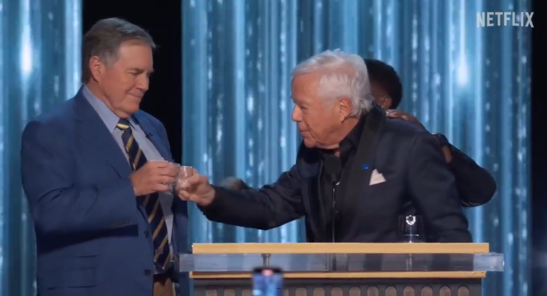 Robert Kraft and Bill Belichick cheers at Tom Brady's Netflix Live Roast on Sunday night