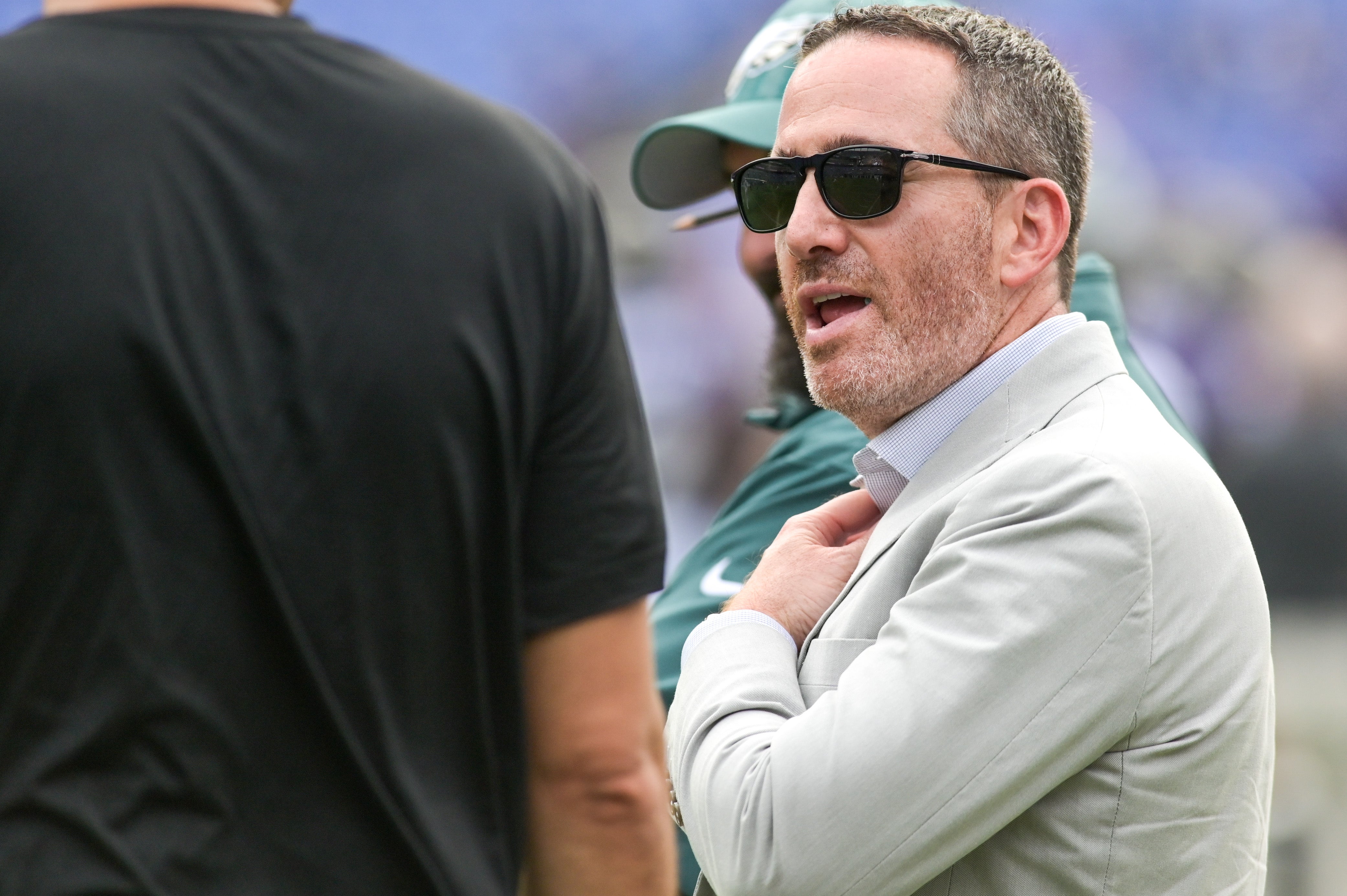 Philadelphia Eagles general manager Howie Roseman speaks with team personal before the game against the Baltimore Ravens at M&T Bank Stadium.
