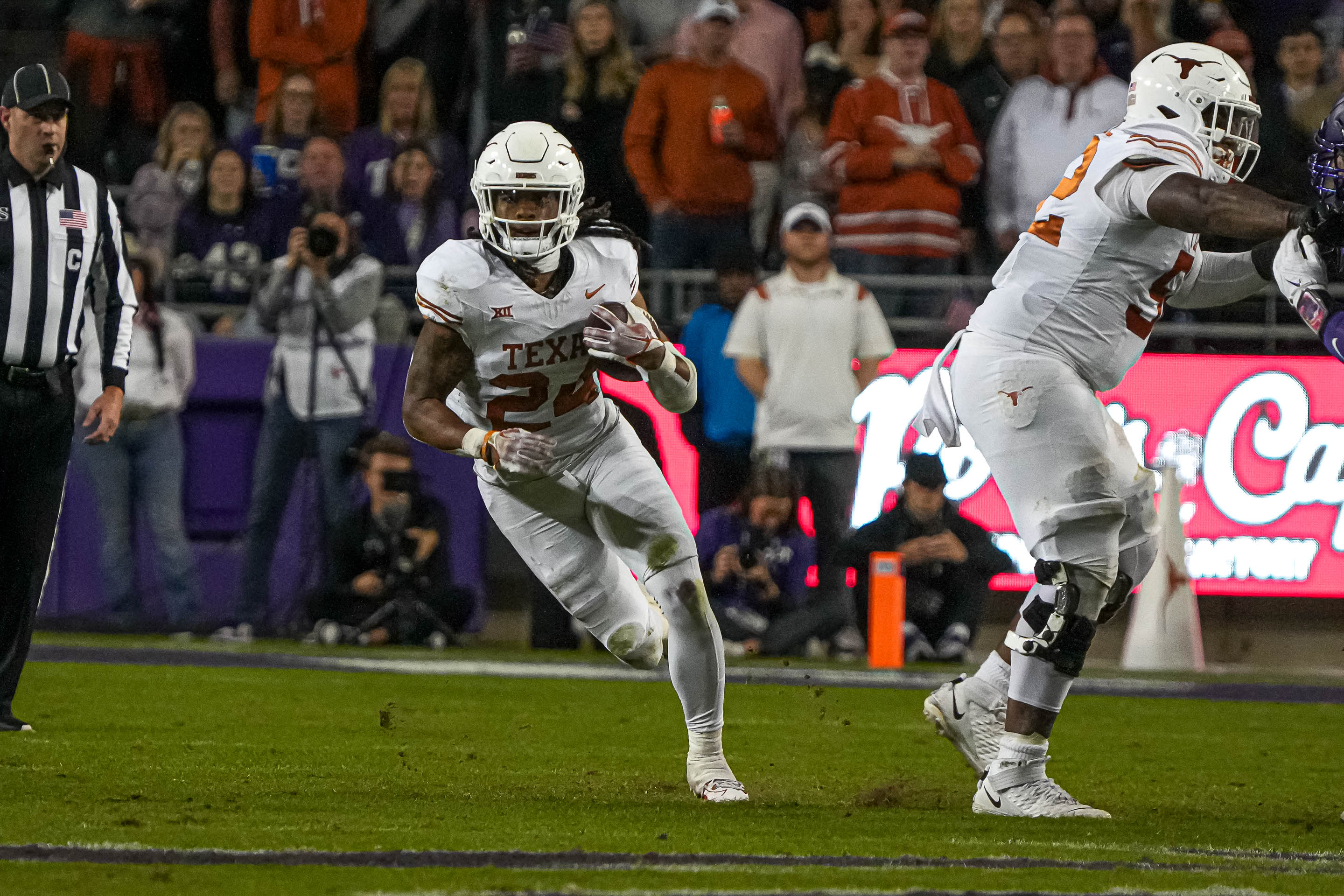 Nov 11, 2023; Fort Worth, Texas, USA; Texas Longhorns running back Jonathon Brooks (24) runs the ball against the TCU Horned Frogs at Amon G. Carter Stadium. Mandatory Credit: Aaron E. Martinez-USA TODAY Sports
