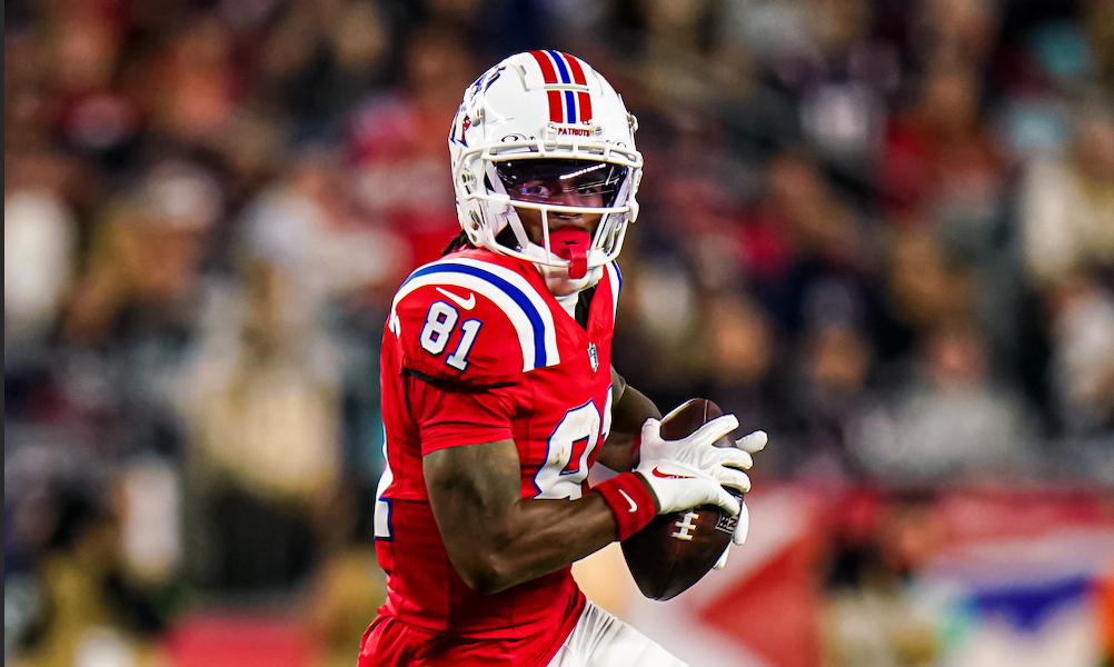 Sep 17, 2023; Foxborough, Massachusetts, USA; New England Patriots wide receiver Demario Douglas (81) runs the ball against the Miami Dolphins in the second quarter at Gillette Stadium.