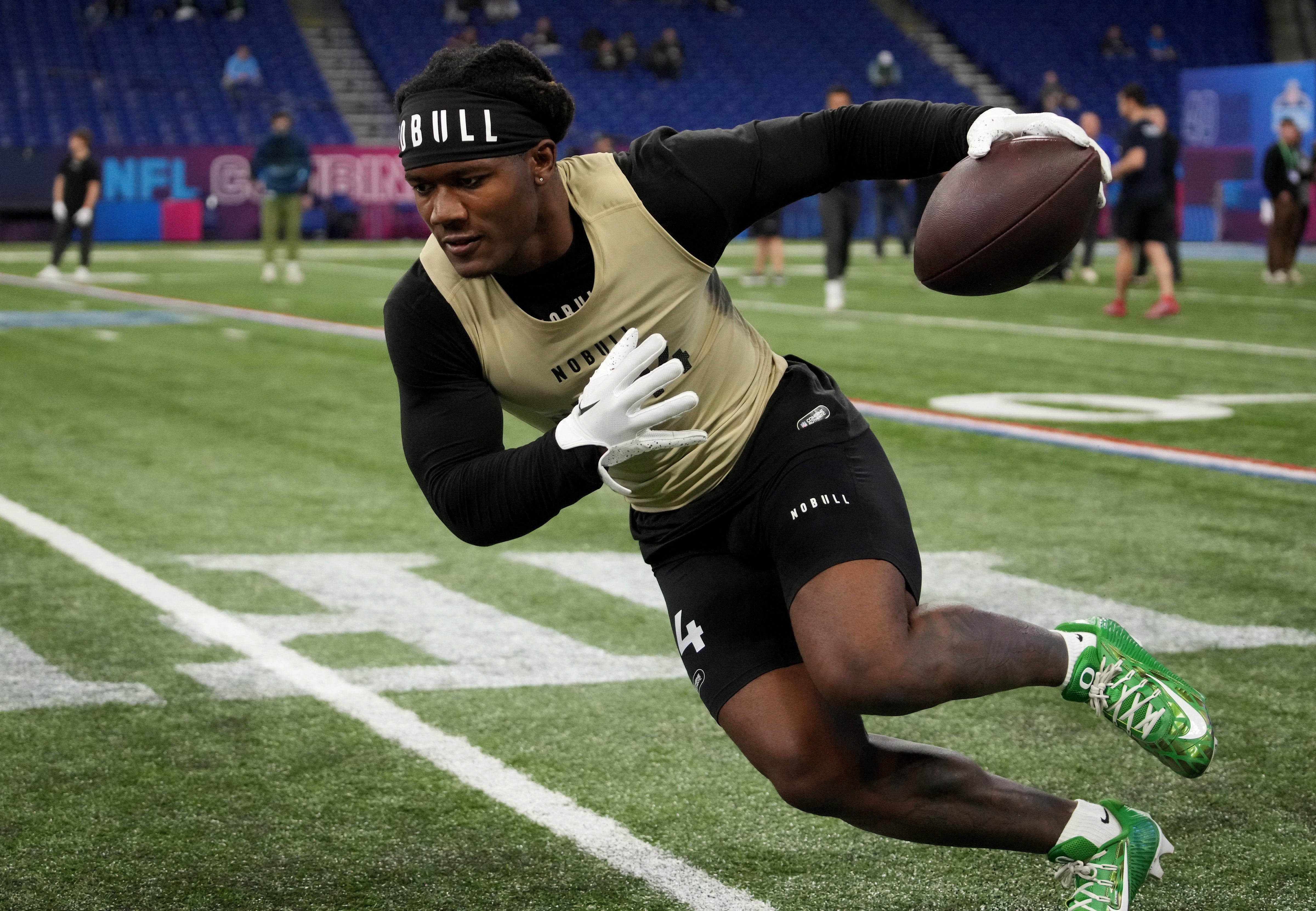 Mar 2, 2024; Indianapolis, IN, USA; Oregon running back Bucky Irving (RB14) during the 2024 NFL Combine at Lucas Oil Stadium.