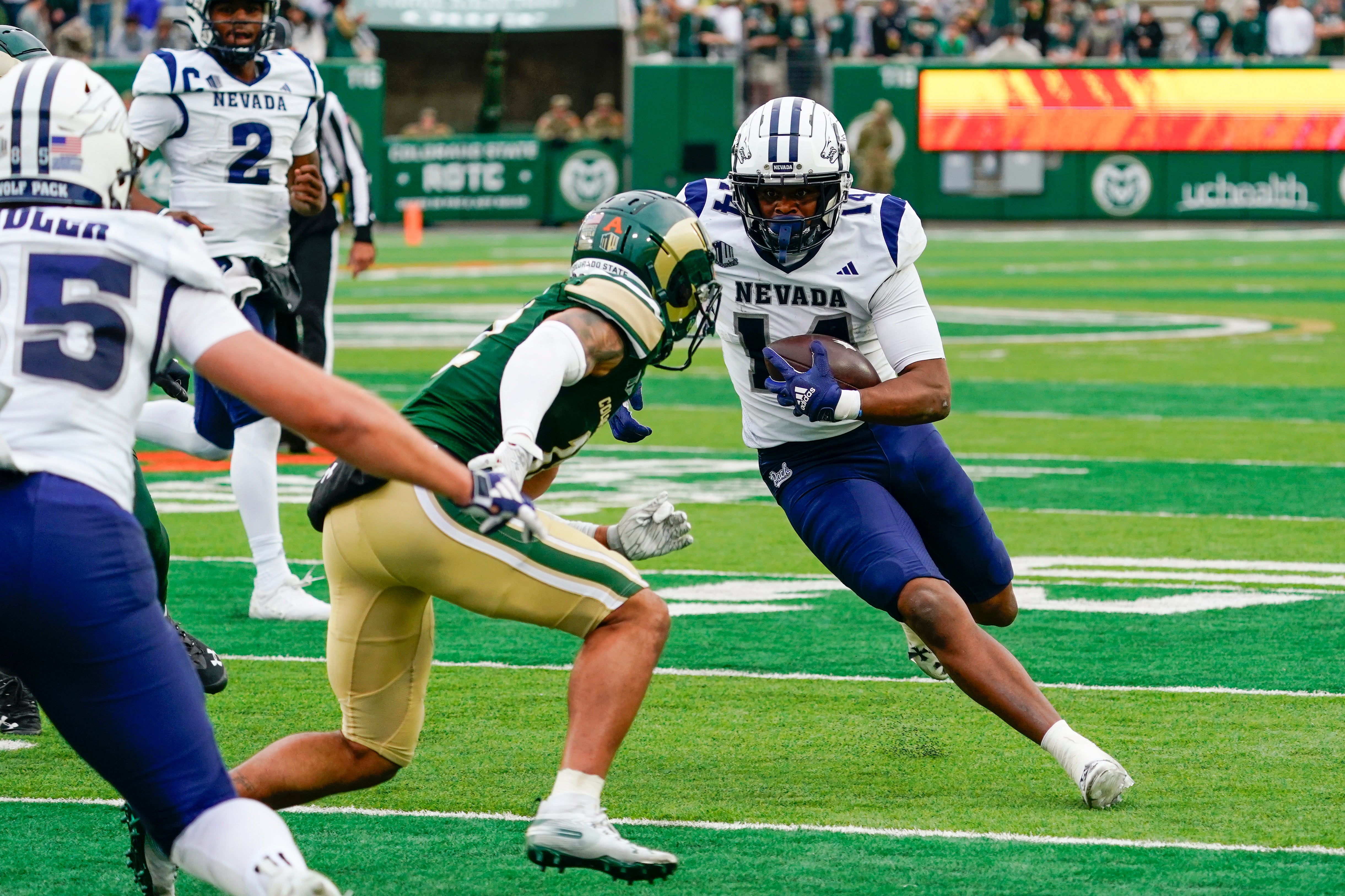 Nov 18, 2023; Fort Collins, Colorado, USA; Nevada Wolf Pack wide receiver John Jackson III (14) runs after a catch in the third quarter against the Colorado State Rams at Sonny Lubick Field at Canvas Stadium.