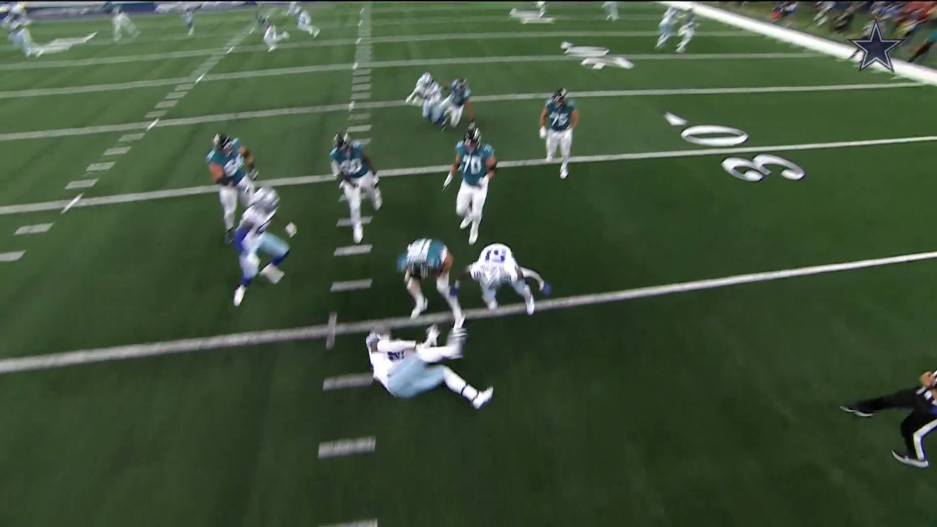 New Giants quarterback Nathan Rourke escaping a sack and scoring a touchdown against the Dallas Cowboys in 2023 NFL preseason.