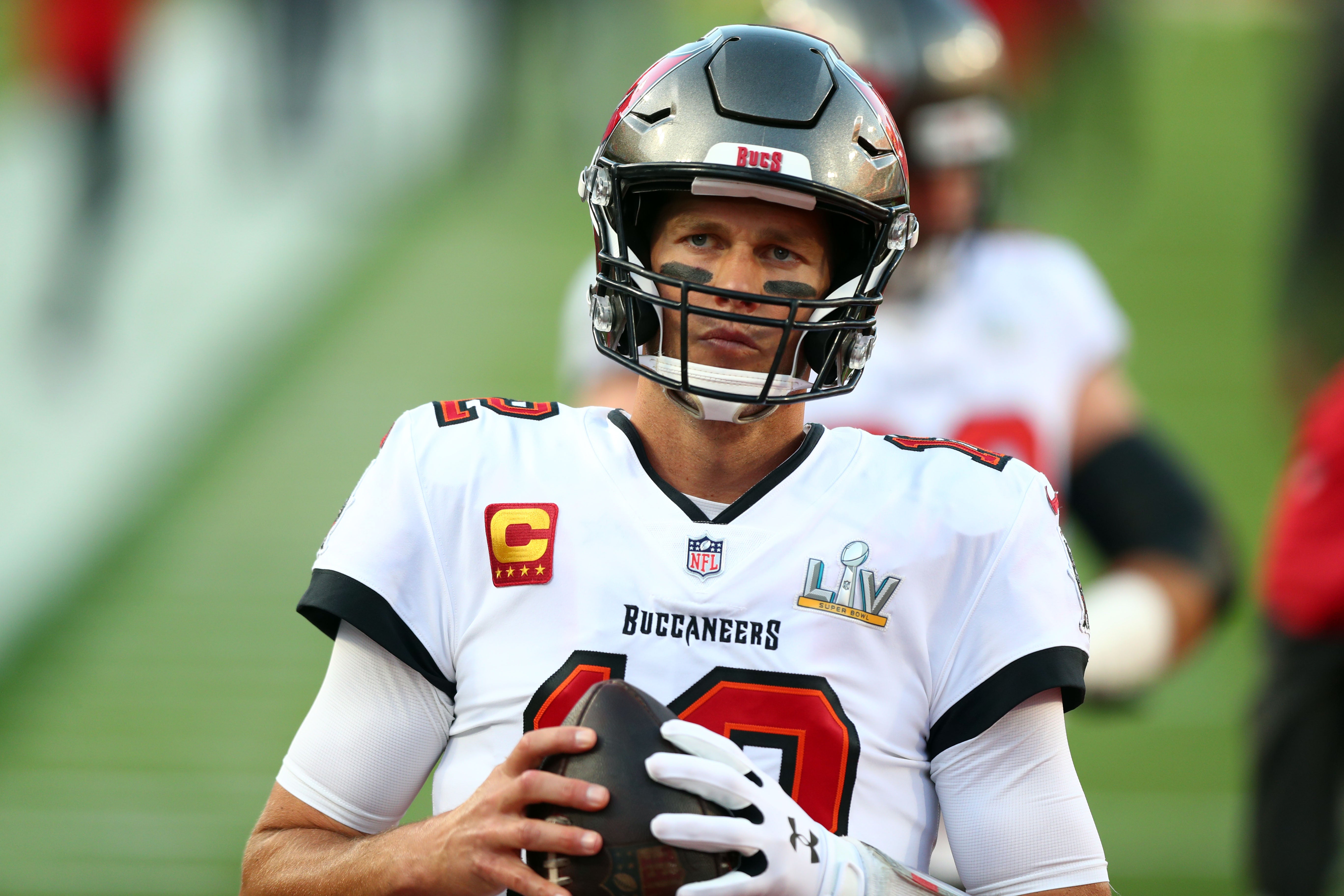 Feb 4, 2020; Tampa, FL, USA; Tampa Bay Buccaneers quarterback Tom Brady (12) warms up before playing the Kansas City Chiefs in Super Bowl LV at Raymond James Stadium.