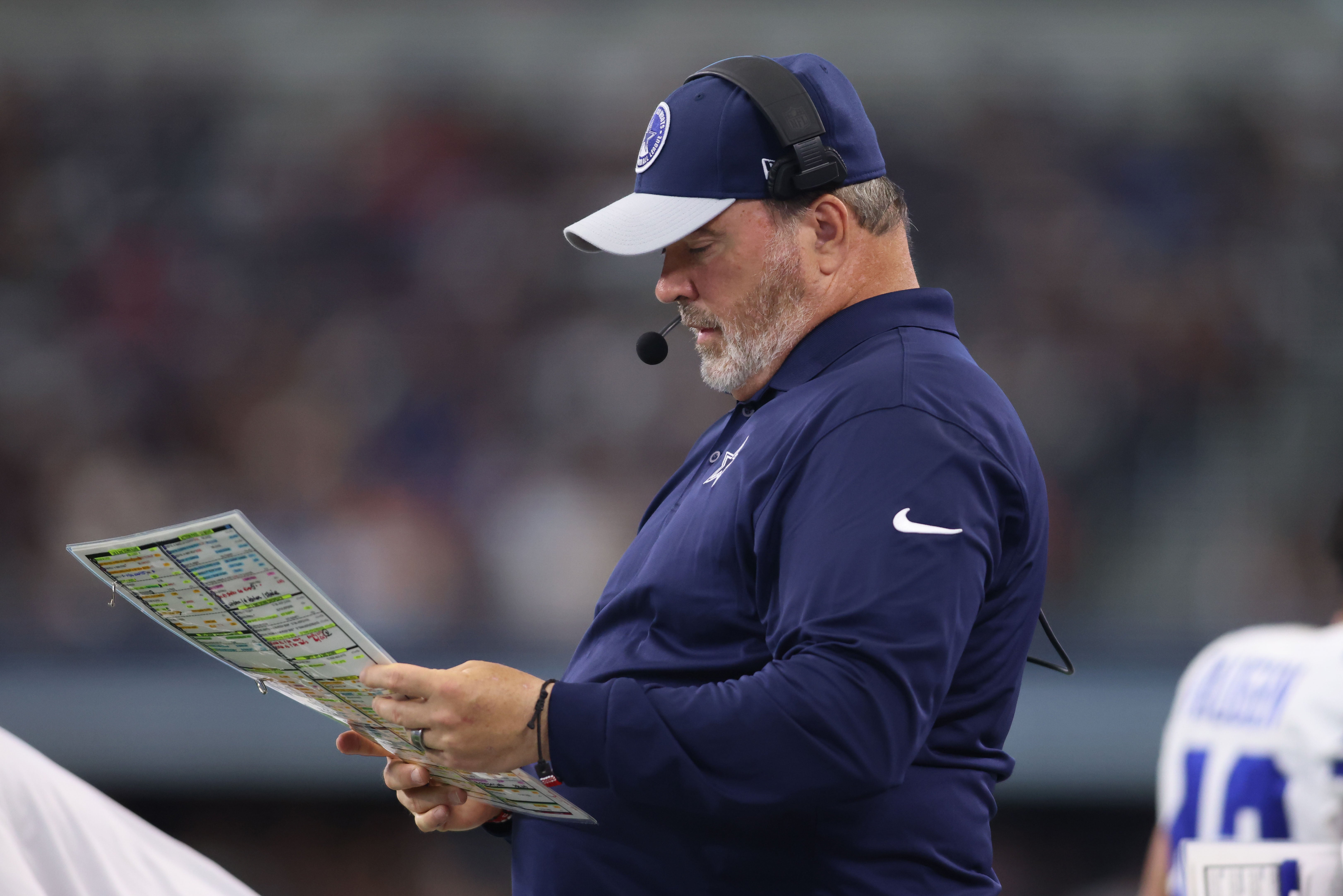 Dallas Cowboys head coach Mike McCarthy calls a play in the third quarter against the Jacksonville Jaguars at AT&T Stadium.