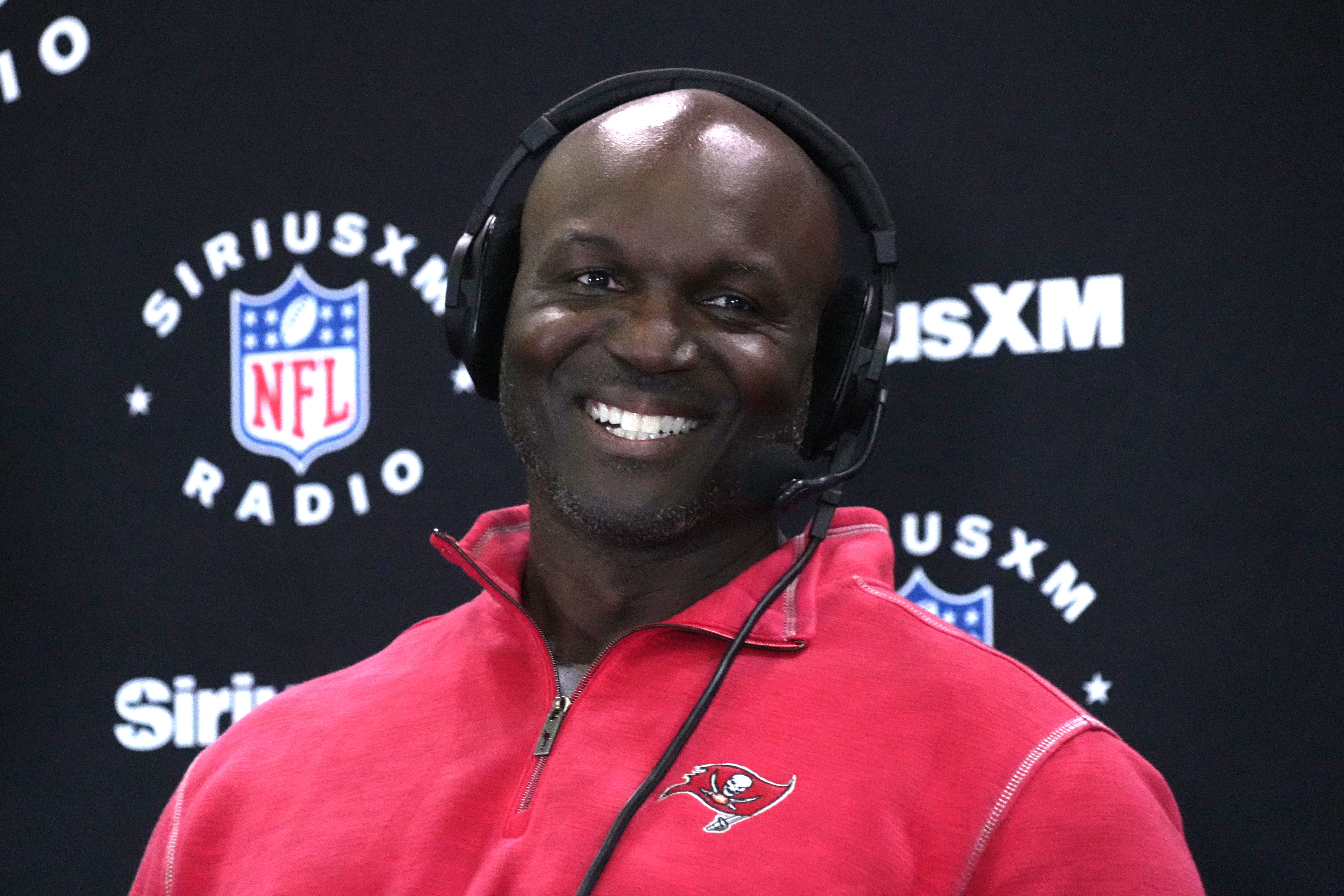Feb 27, 2024; Indianapolis, IN, USA; Tampa Bay Buccaneers head coach Todd Bowles on the SiriusXM radio set during the NFL Scouting Combine at Indiana Convention Center.