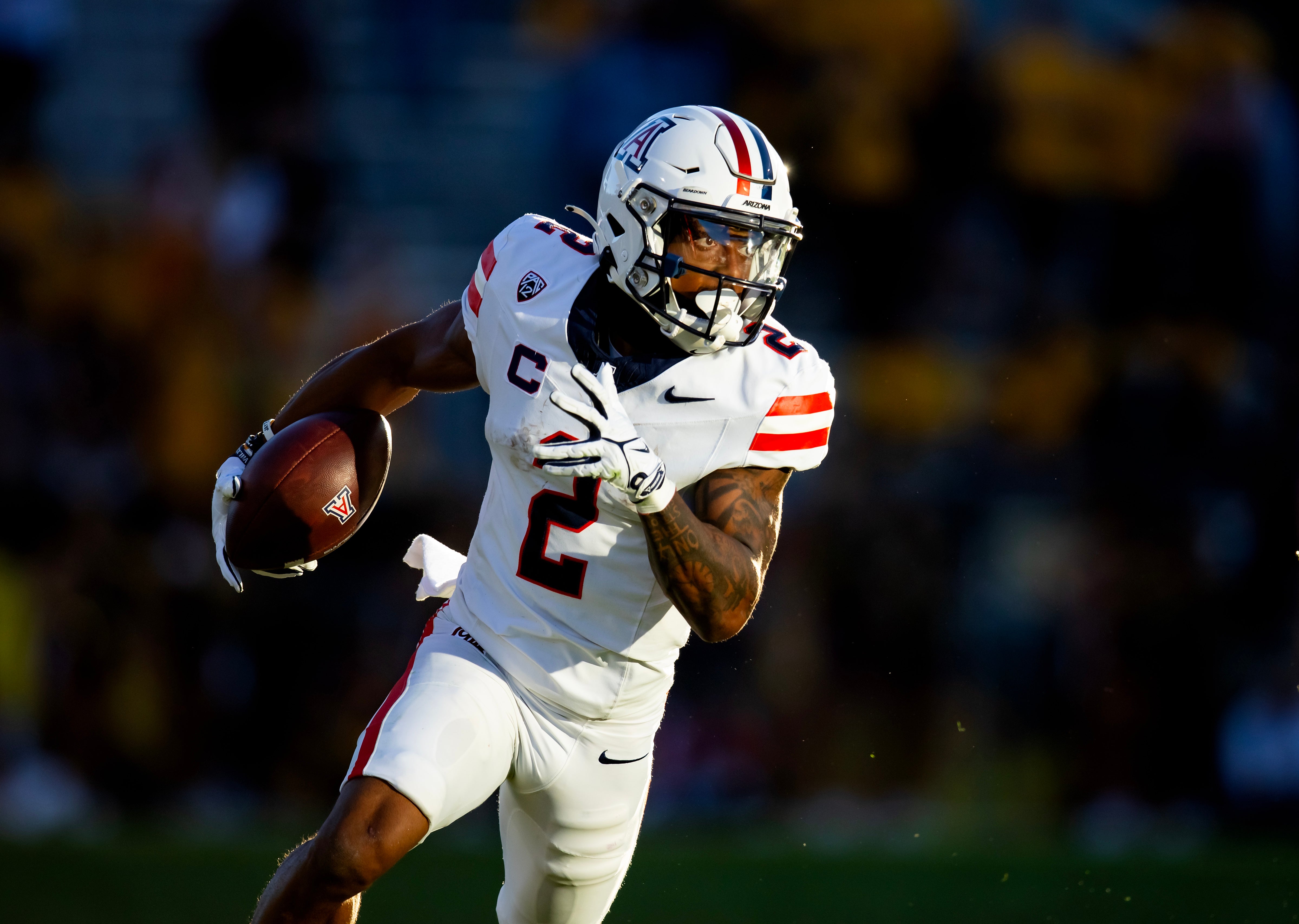 Nov 25, 2023; Tempe, Arizona, USA; Arizona Wildcats wide receiver Jacob Cowing (2) against the Arizona State Sun Devils in the first half of the Territorial Cup at Mountain America Stadium.