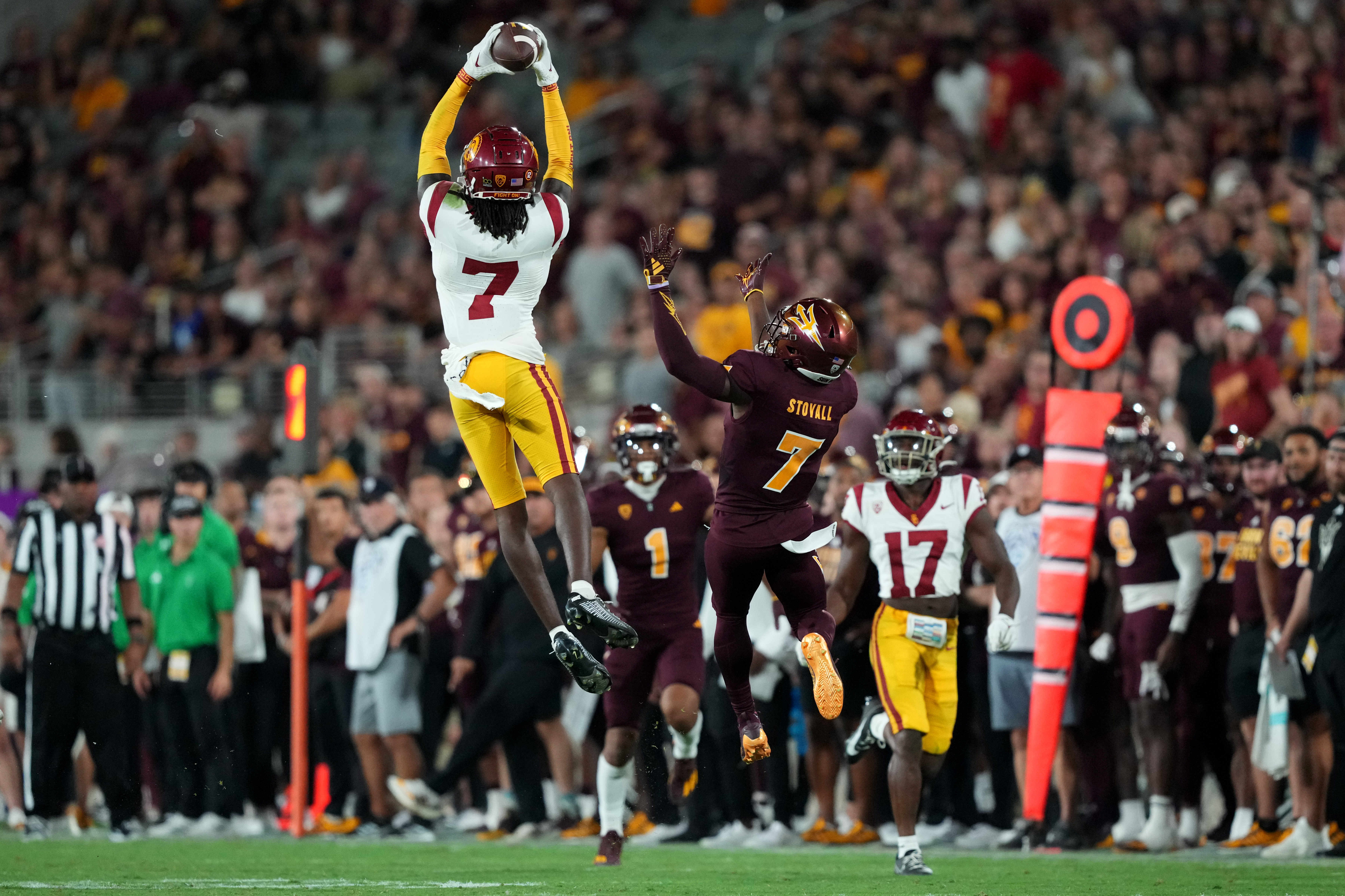 Sep 23, 2023; Tempe, Arizona, USA; USC Trojans safety Calen Bullock (7) intercepts a pass intended for Arizona State Sun Devils wide receiver Melquan Stovall (7) during the second half at Mountain America Stadium, Home of the ASU Sun Devils.